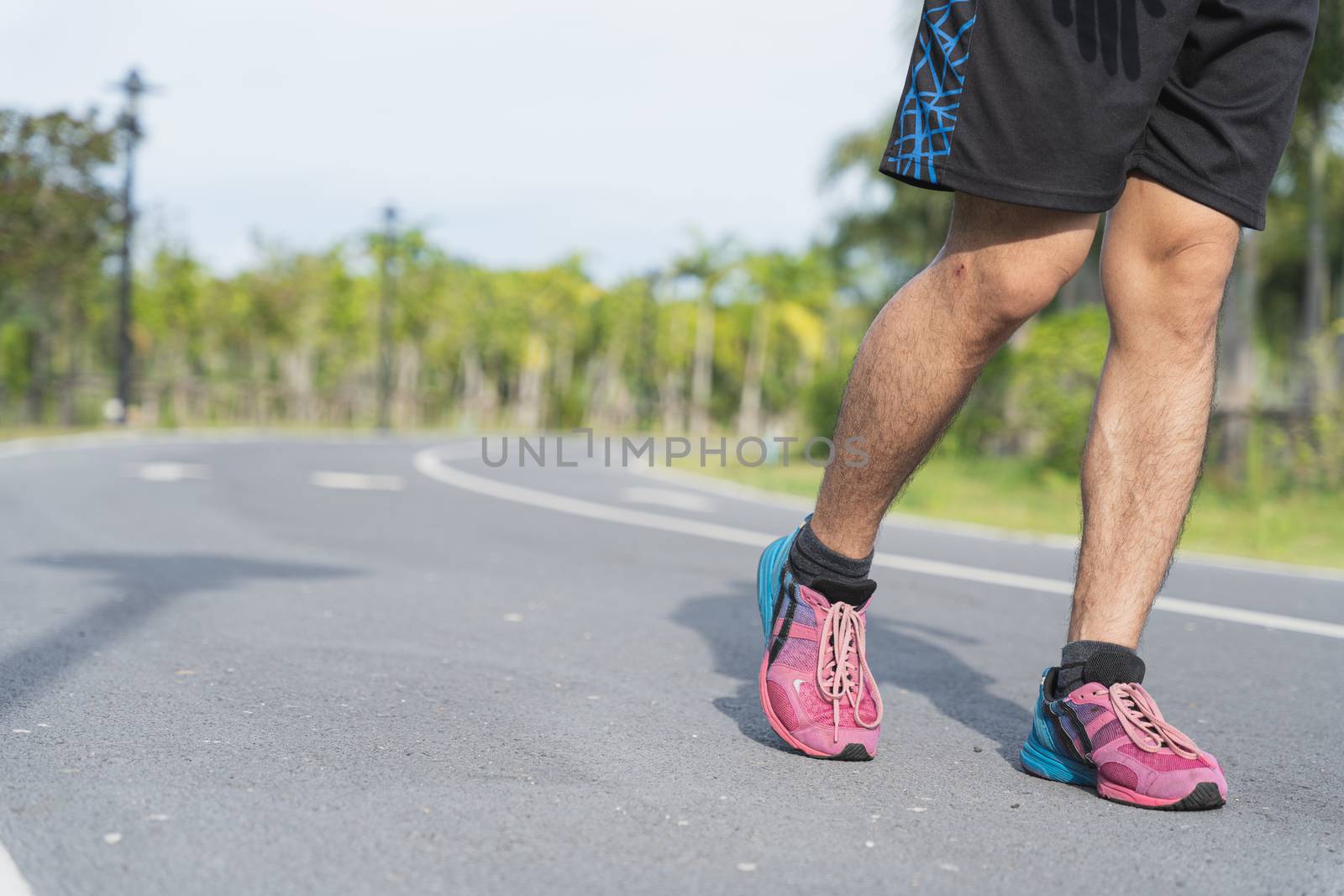 Close-up of Athlete shoes while running and walking in park. Sport and exercise concept