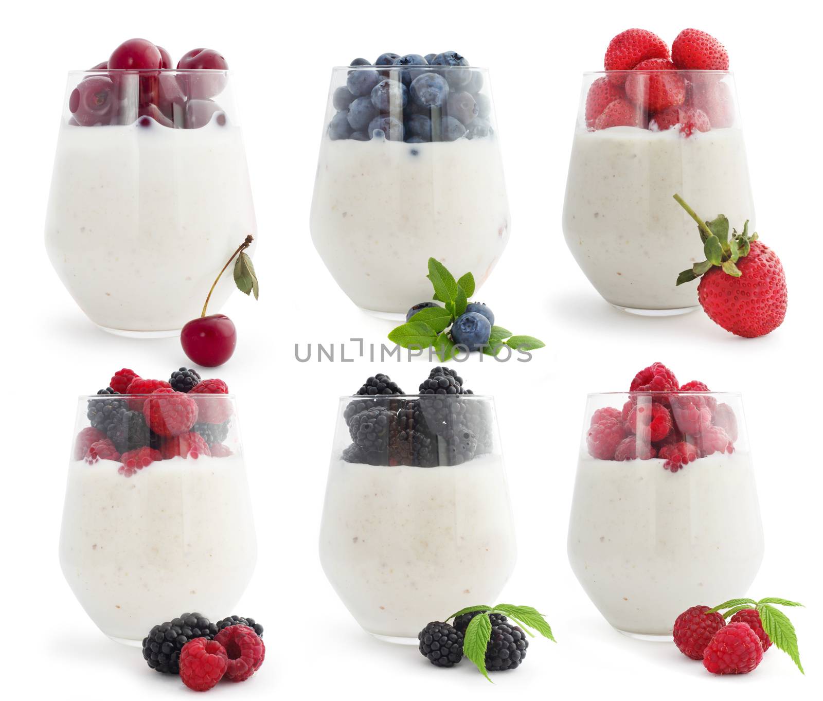 Healthy and useful colorful berry cocktalis, smoothies and milkshakes with yogurt, fresh fruit berries cereals and nuts studio isolated on white background
