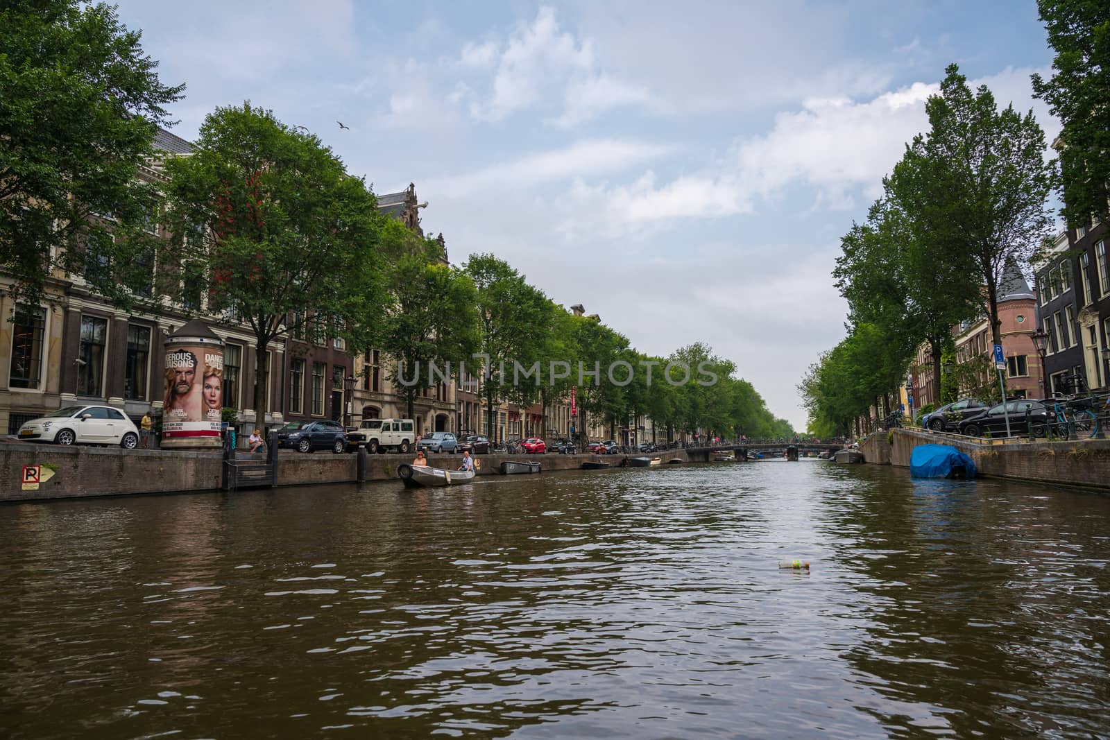 Amsterdam, the Netherlands — July 28, 2019. A wide angle photo looking down one of Amsterdam's canals