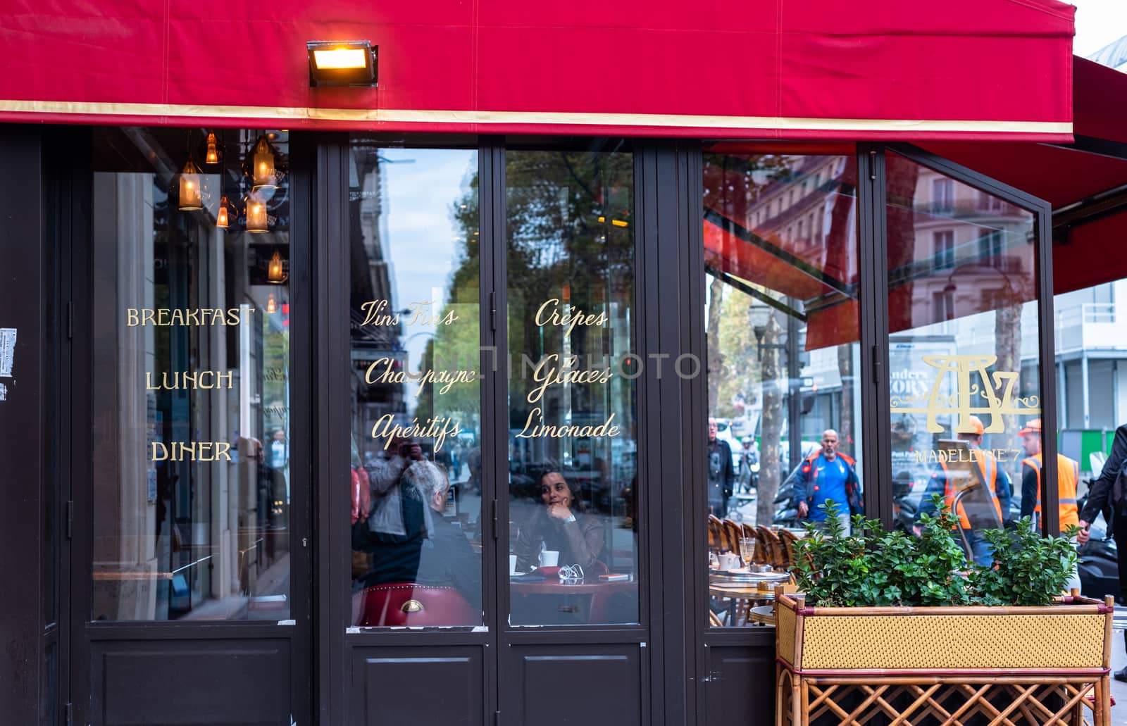Inside and Outside a Paris Cafe by jfbenning