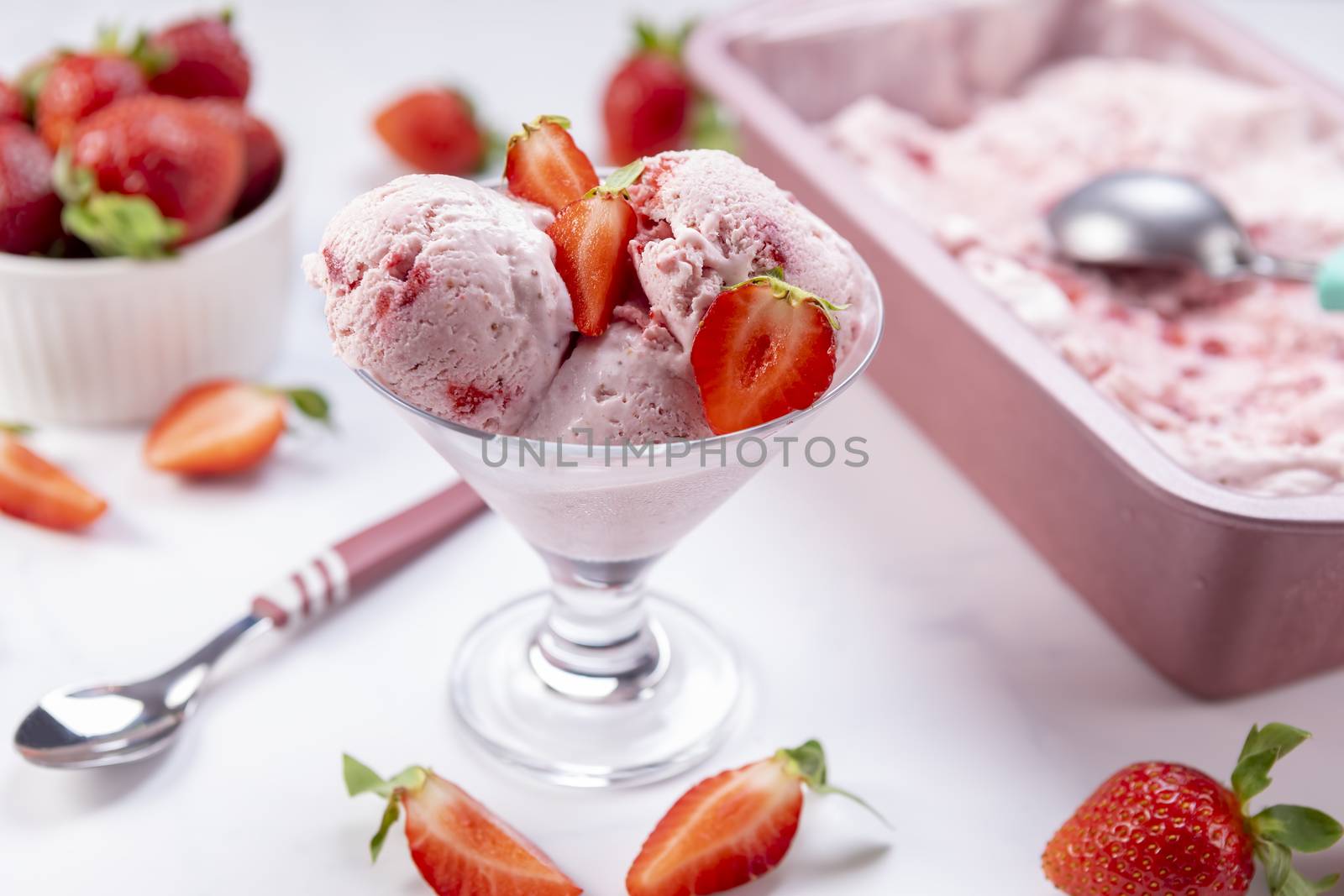 Homemade strawberry ice cream ready to be served by manaemedia