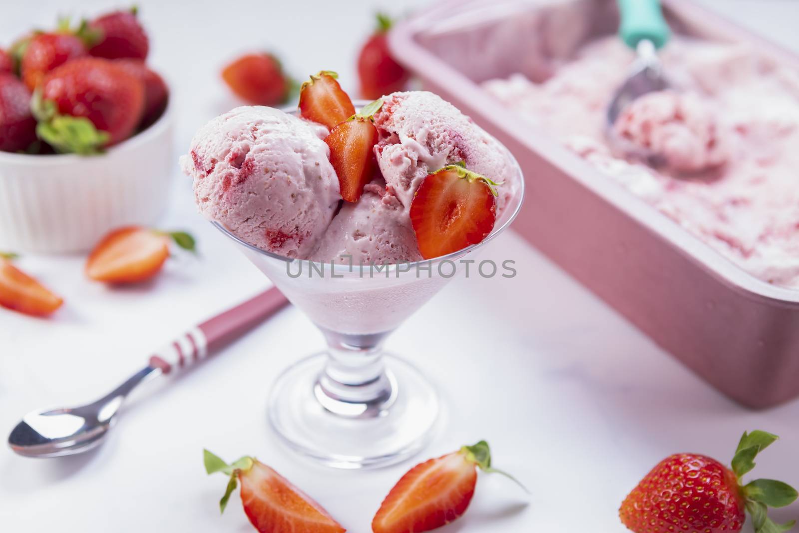 Homemade strawberry ice cream ready to be served by manaemedia