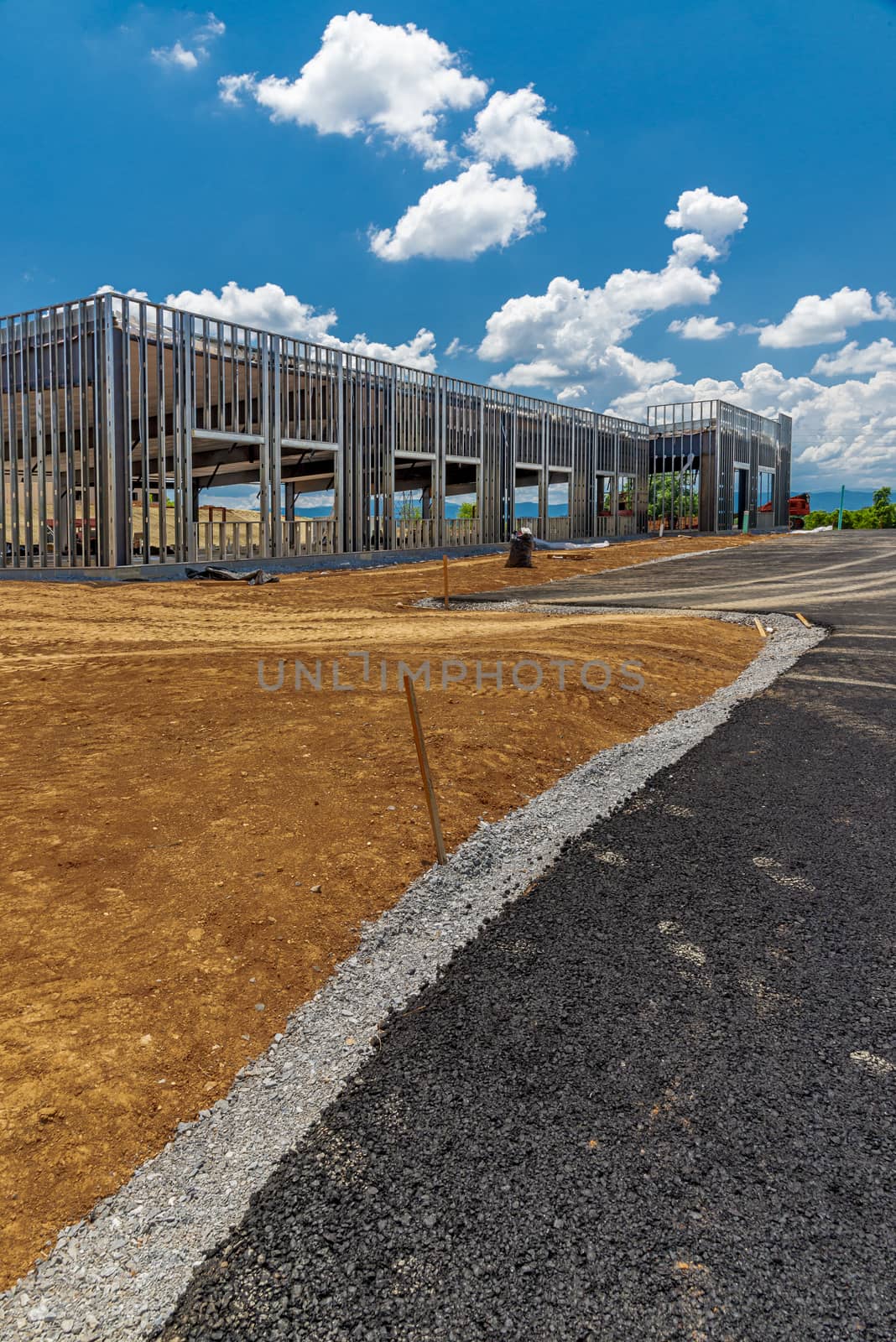 Vertical shot of a new building structure under construction.