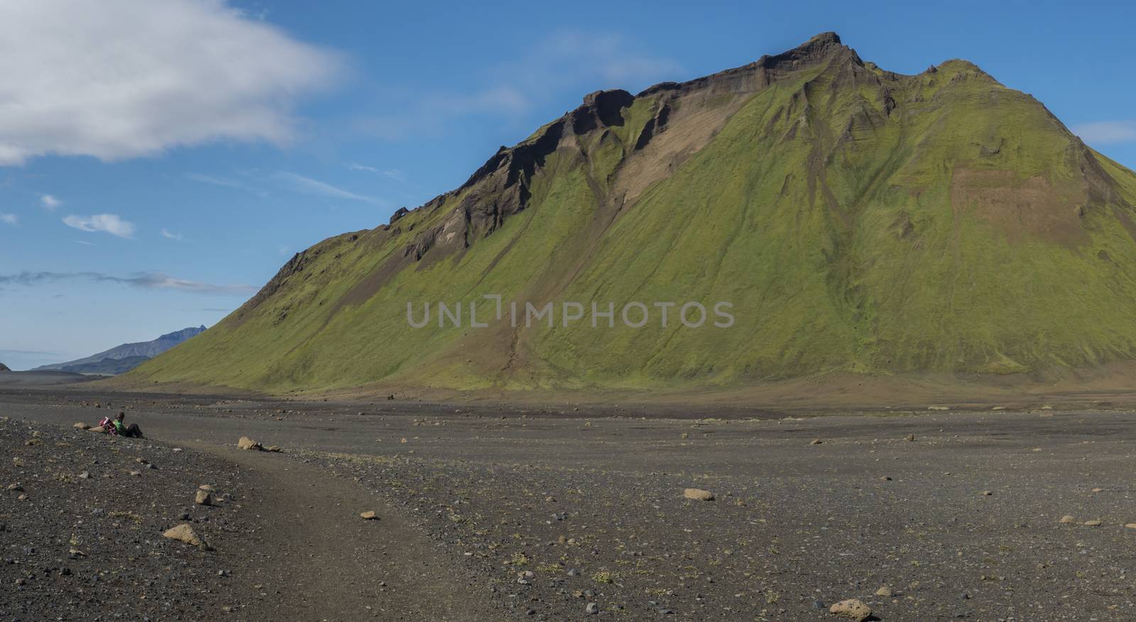 Panoramic view on green Hattafell mountain in Volcanic landscape behind Emstrur camping site on Laugavegur trek. Area of Fjallabak Nature Reserve in Highlands region of Iceland.