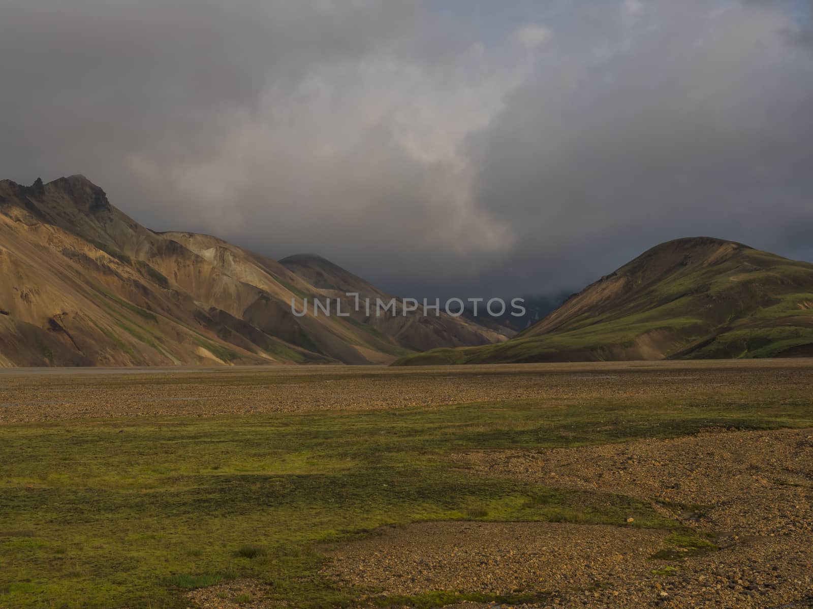 Beautiful scenic panorama of colorful volcanic mountains in Landmannalaugar camp site area of Fjallabak Nature Reserve in Highlands region of Iceland.