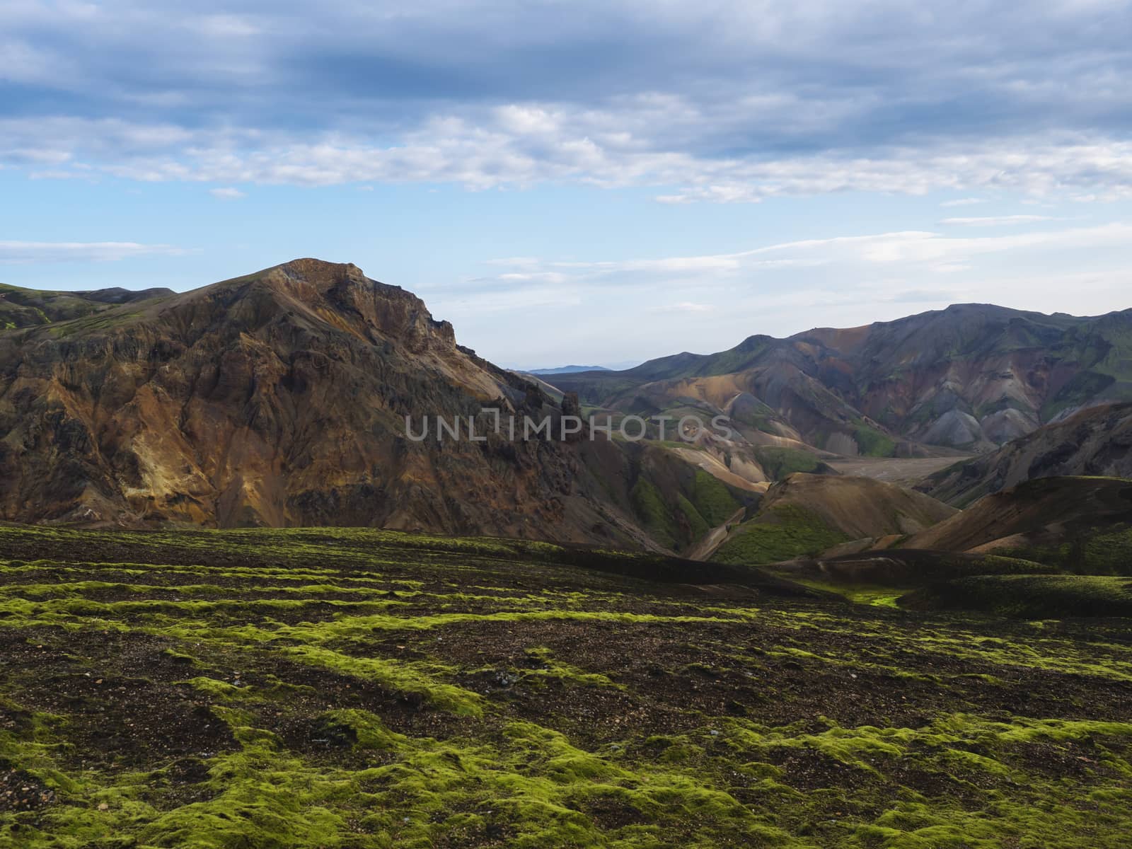 Colorful Rhyolit mountain panorma with multicolored volcanos in Landmannalaugar area of Fjallabak Nature Reserve in Highlands region of Iceland.