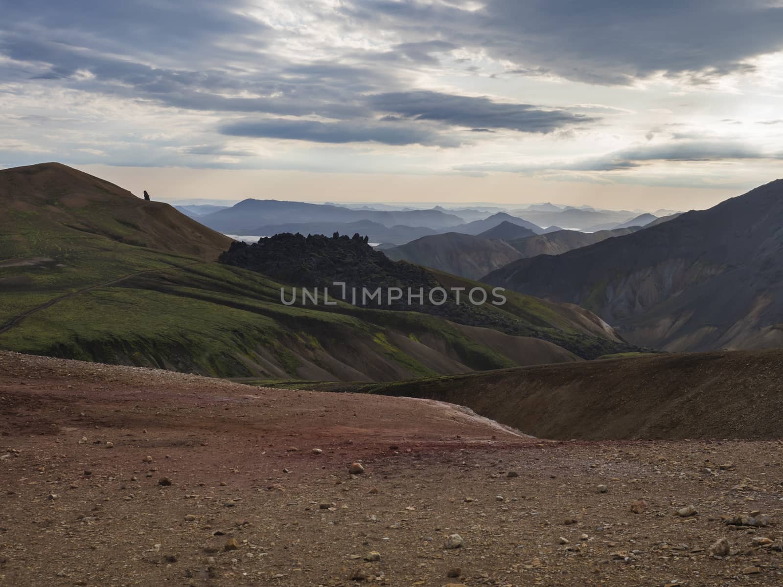 Colorful Rhyolit rainbow mountain panorma with multicolored volcanos. Sunrise in Landmannalaugar at Fjallabak Nature Reserve, Highlands Iceland.