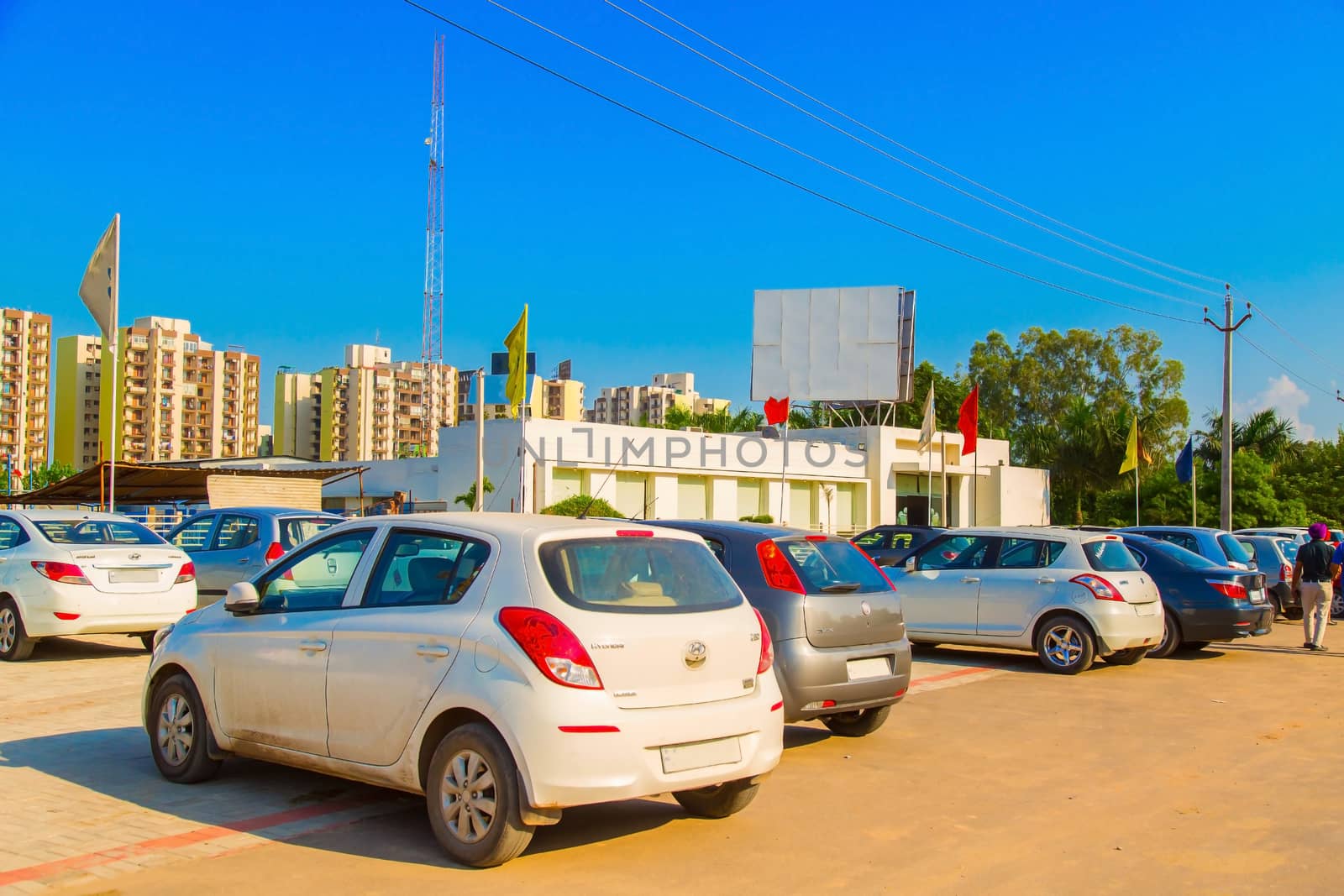 ranchi, India - june 2019 : a big car parking near under construction buildings in ranchi