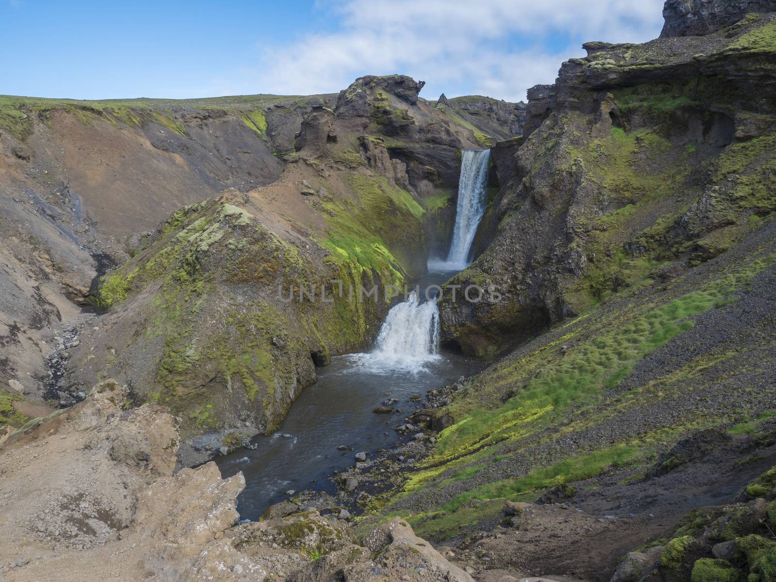 Beautifull waterfall on the Skoga River with no people on famous Fimmvorduhals trail second part of Laugavegur trek. Summer landscape on a sunny day. Amazing in nature. August 2019, South Iceland.