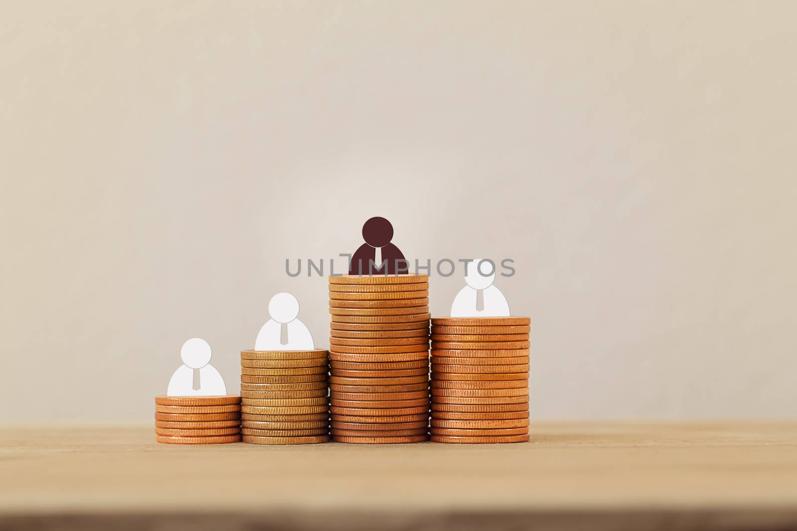 Symbol of creativity, creative idea, Great business success concept : Businessman symbol on rising coins. Depicts tycoon achieving goals, Create a financial success strategy.