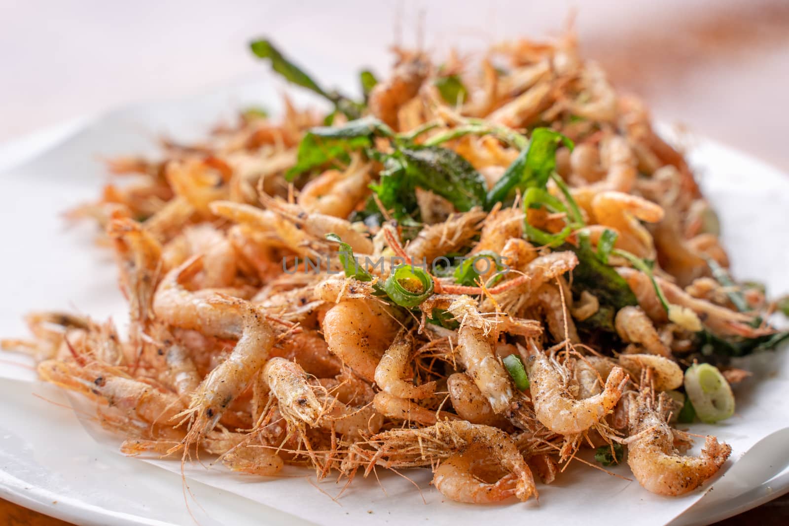 Salted fried crispy river shrimp prawn, Macrobrachium nipponense by ROMIXIMAGE