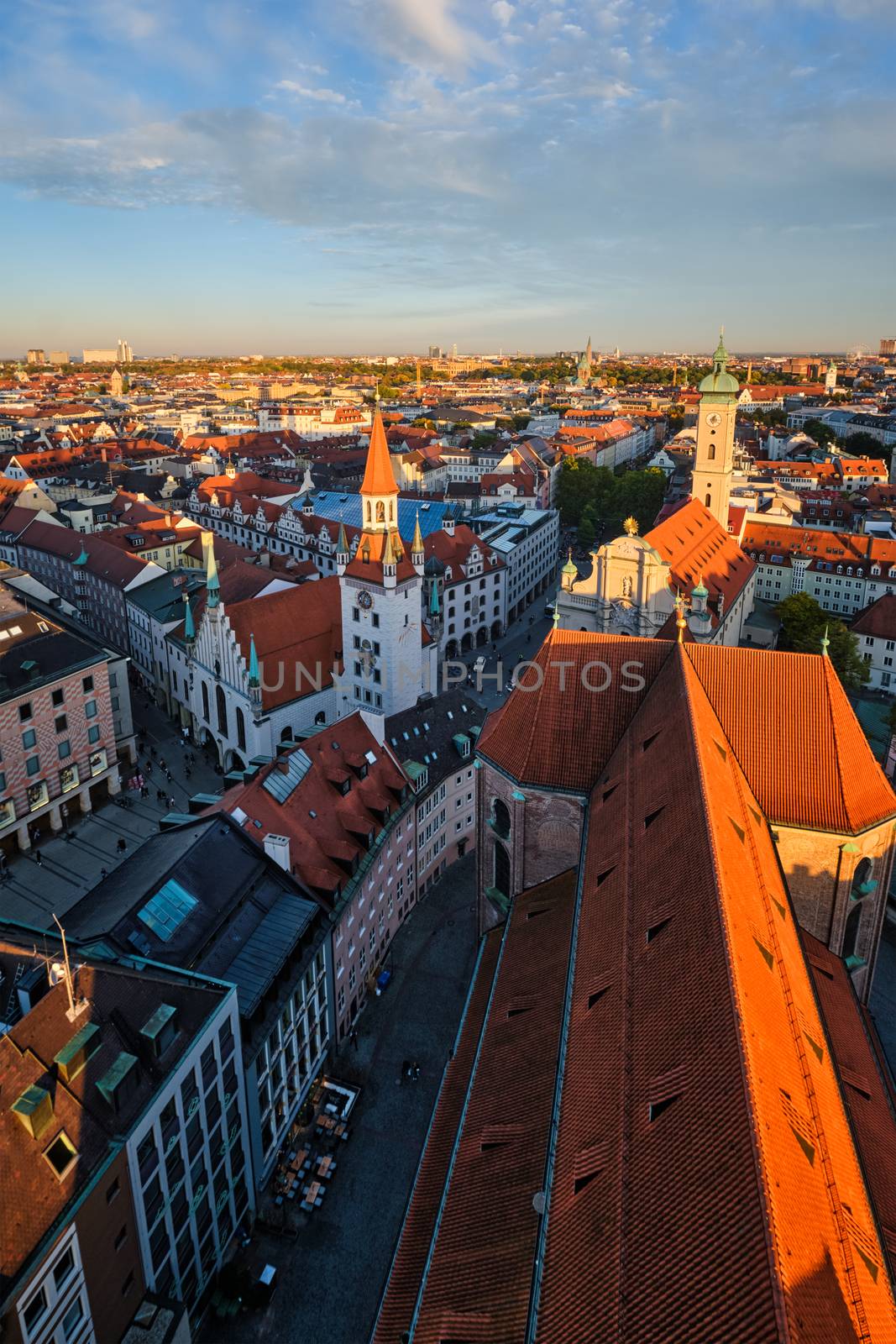 Aerial view of Munich - Marienplatz and Altes Rathaus from St. Peter's church on sunset. Munich, Germany