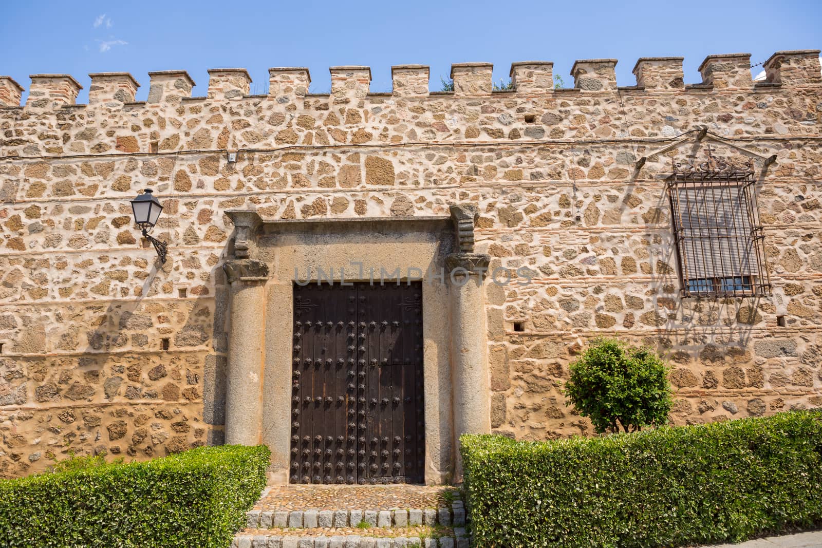 the medieval facade of the Palace de la Cava (16th century). Toledo, Spain