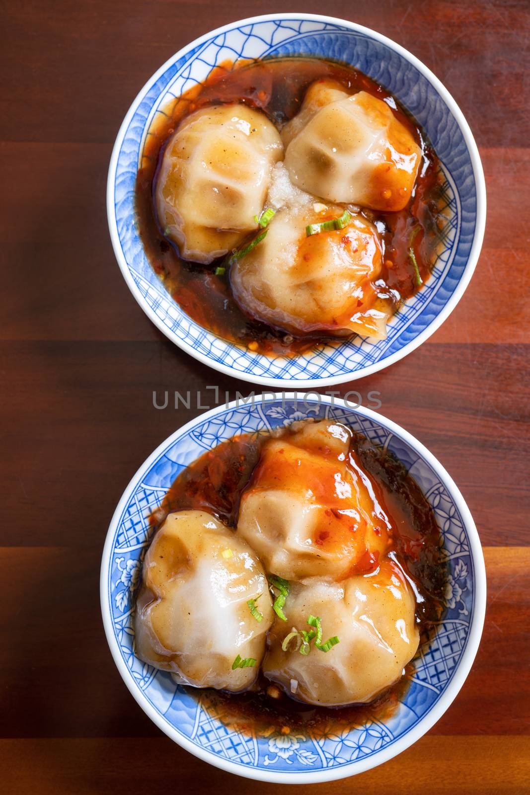 Bawan (Ba wan), Taiwanese meatball delicacy, delicious street food, steamed starch wrapped round shaped dumpling with pork inside, close up, copy space