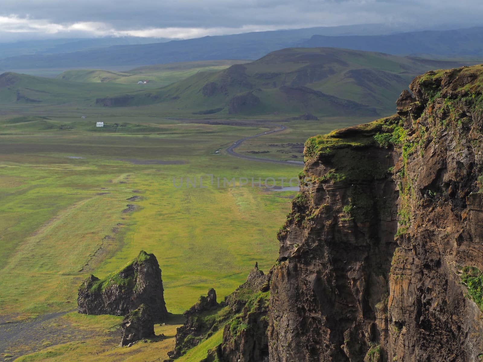 magic iceland landscapes near vik i mirdal with scharp rocks and green hills