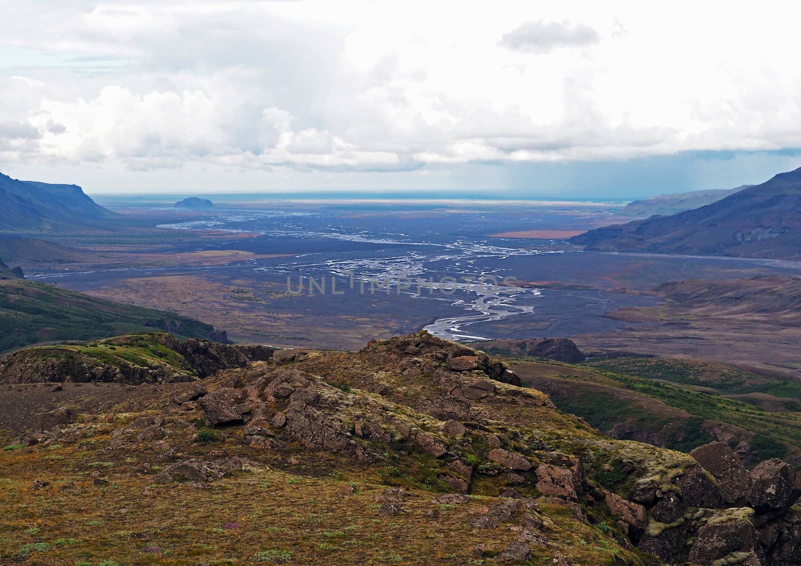 godaland and thorsmork national park in iceland  - colourful view on river bed Krossa with big mossed stones