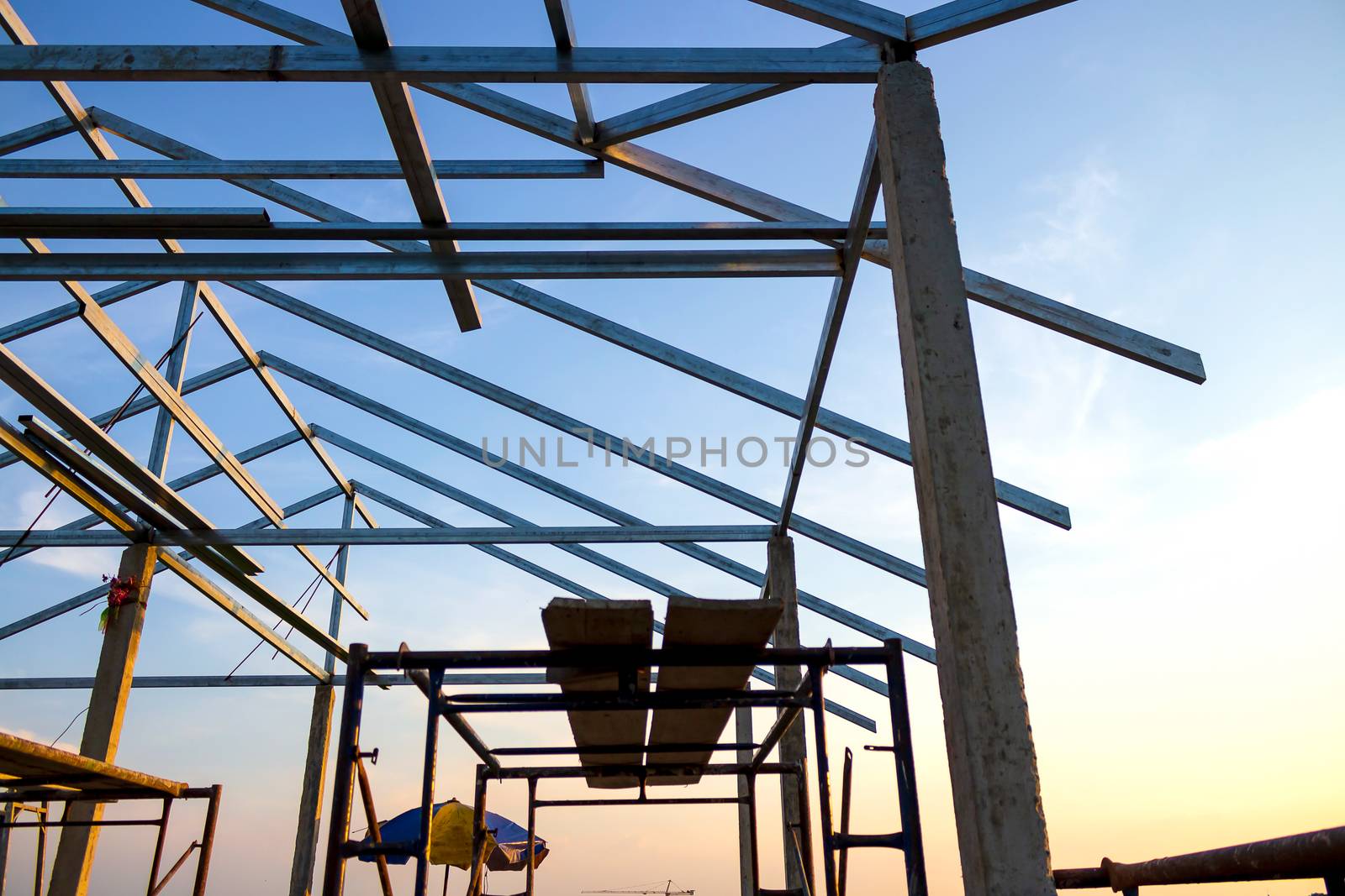 New home construction site Steel roof mortar scaffolding on countryside nature