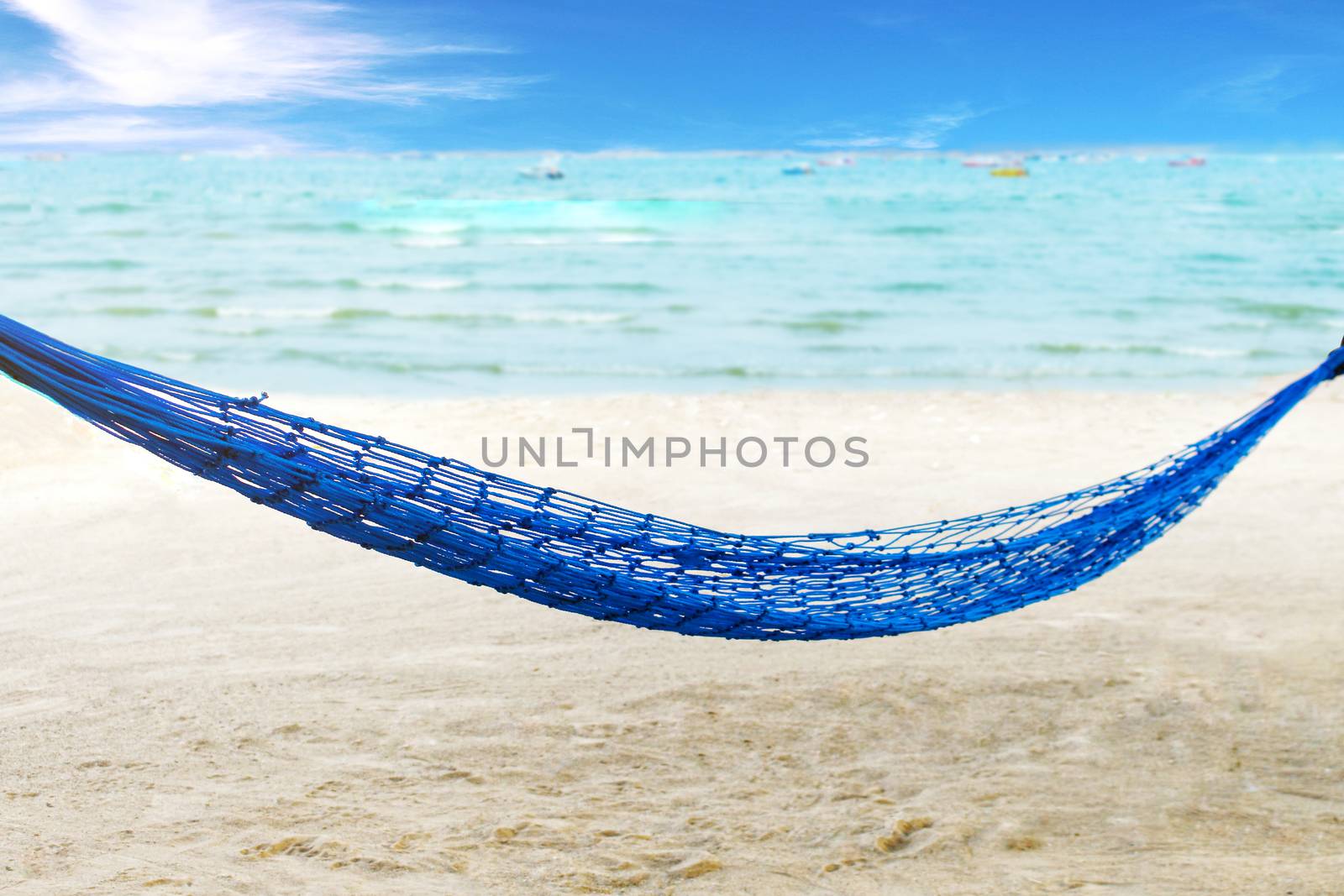 Hammock, Beautiful tropical Pattaya beach and sea in island with coconut palm tree and blue sky background - Image by yodsawai