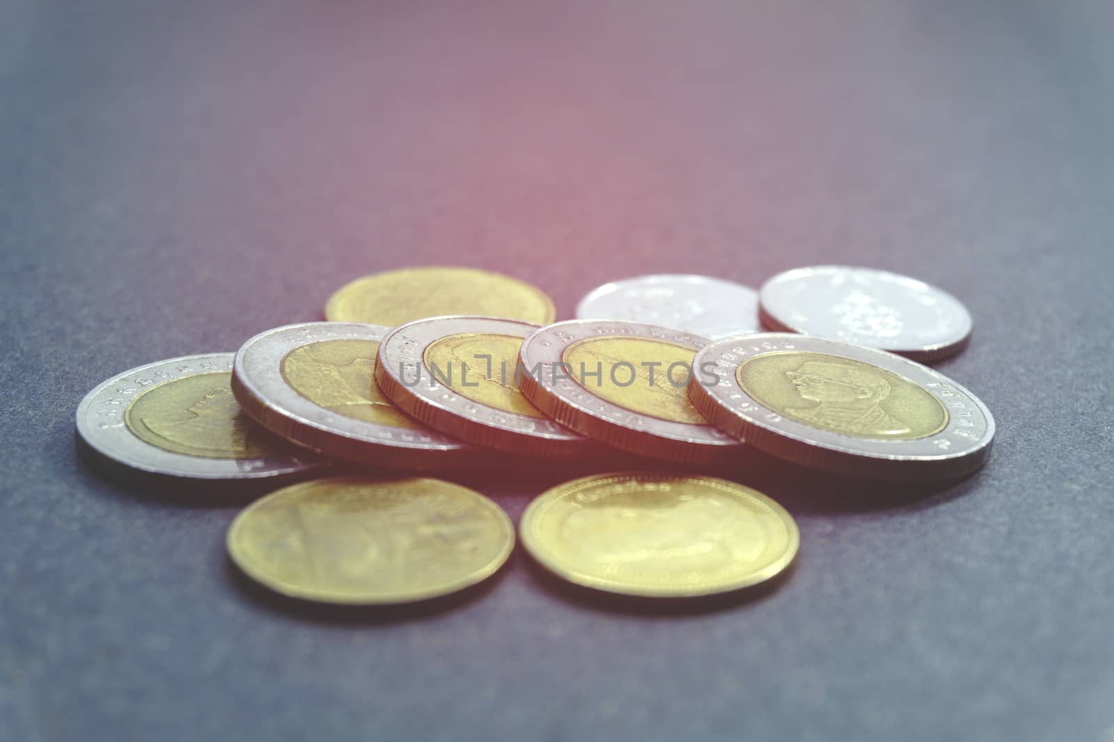 Thai baht of coins Set of Currency coin 1, 2, 5, and 10 baht of Thailand on black background