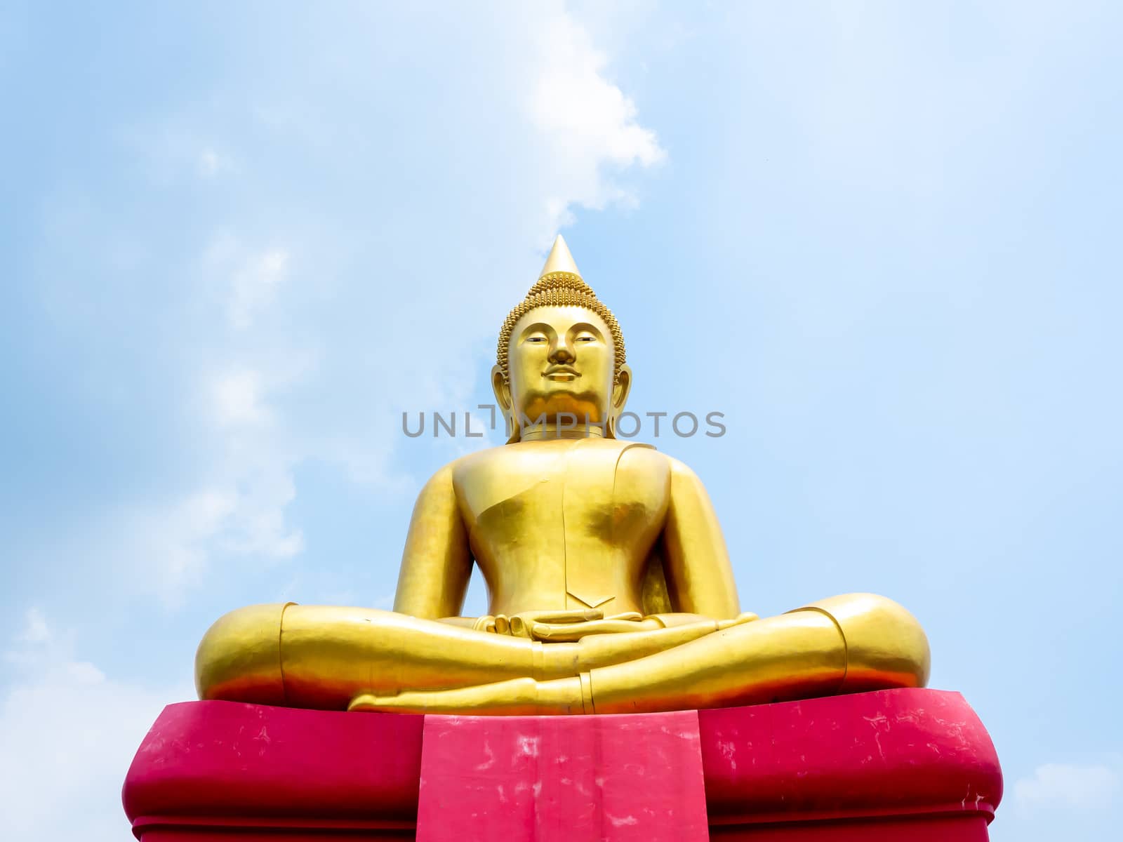 PATHUM THANI, THAILAND - May 2 : 2020. Beautiful big buddha "Luang Phor Sothorn" on blue sky background at Wat Bot Temple at Pathum Thani, THAILAND.