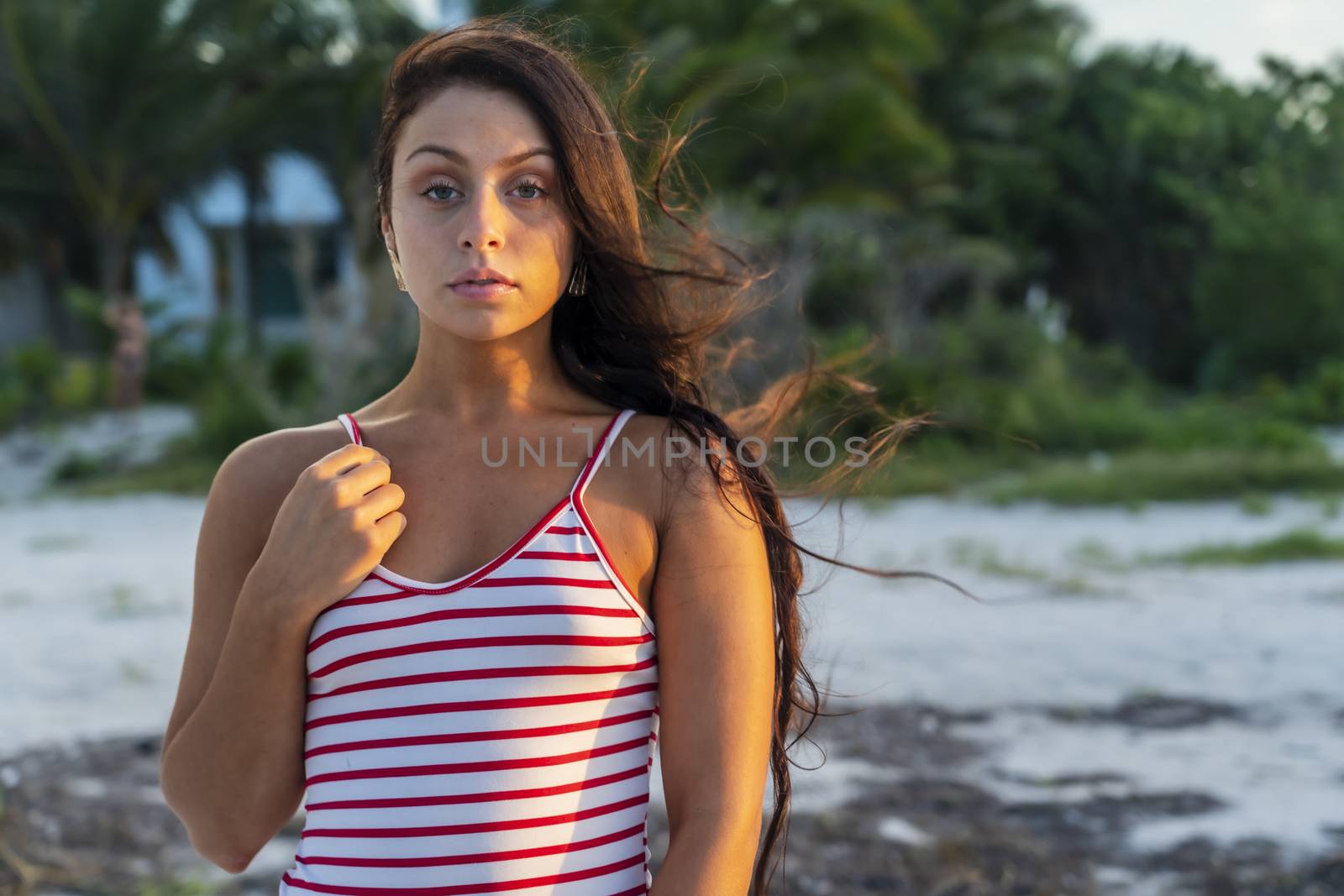 A Lovely Brunette Model Enjoys The Sunset While On Vacation In The Yucatán Peninsula Near Merida, Mexico by actionsports
