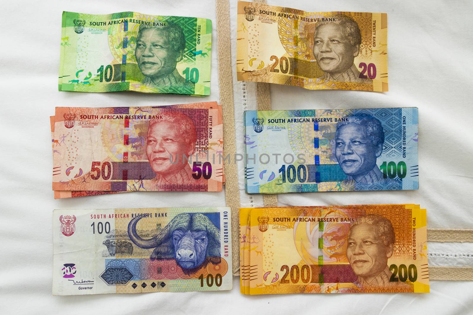 South African colorful banknotes money with Nelson Mandela. by Arkadij