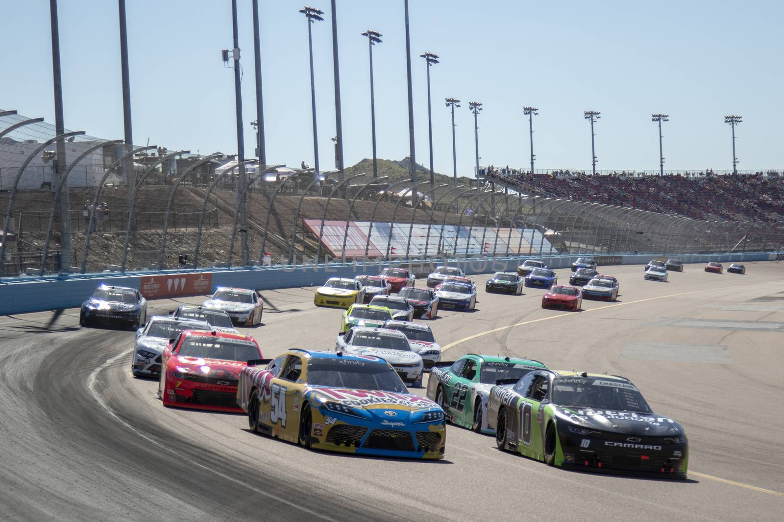 Ross Chastain (10) races for position for the LS Tractor 200 at Phoenix Raceway in Avondale, Arizona.