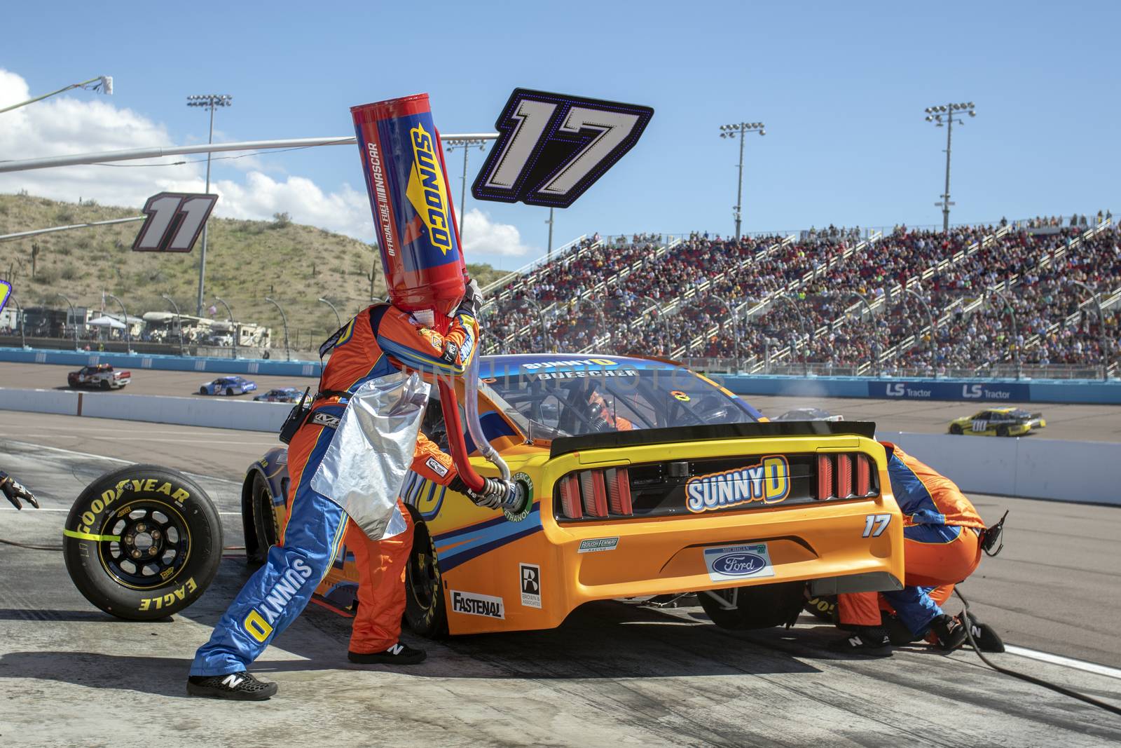 Chris Buescher (17) and crew make a pit stop for the FanShield 500 at Phoenix Raceway in Avondale, Arizona.