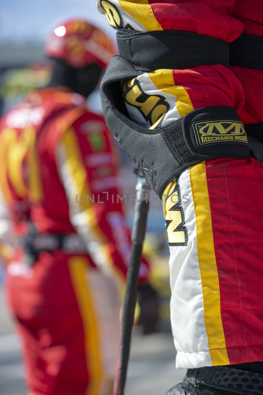 Kyle Larson (42) and pit crew make a pit stop for the FanShield 500 at Phoenix Raceway in Avondale, Arizona.
