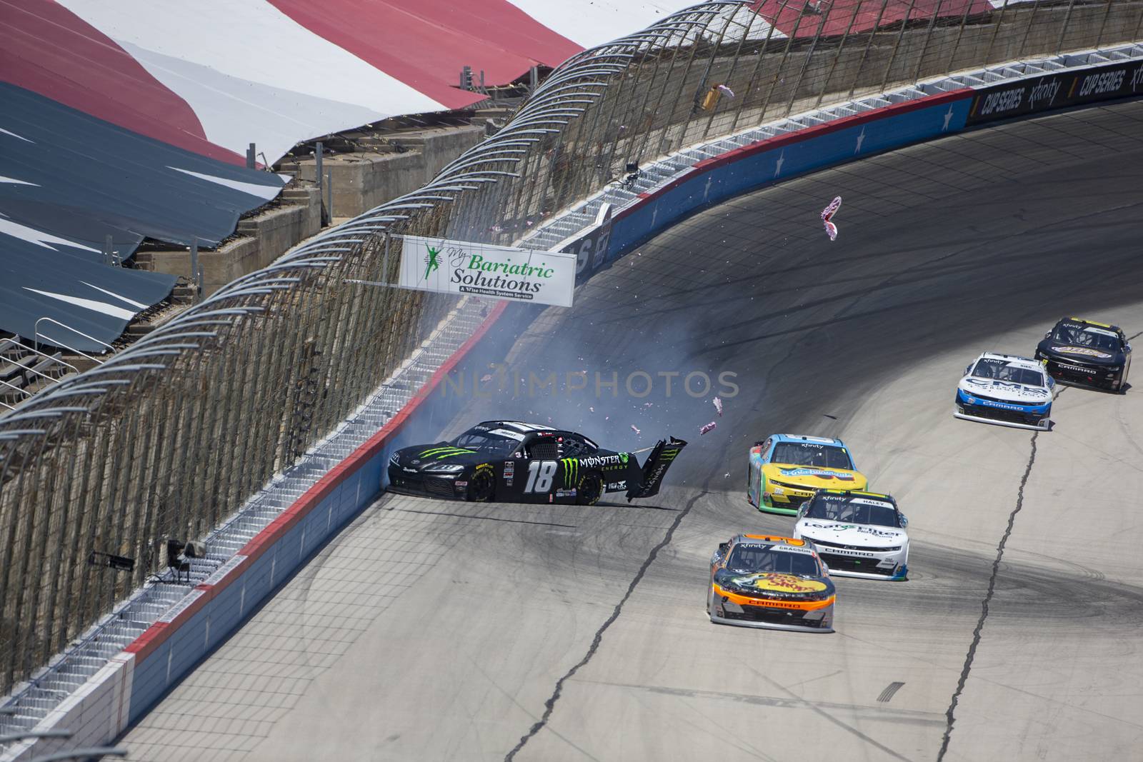 Riley Herbst (18) battles for position and loses control for the My Bariatric Solutions 300 at Texas Motor Speedway in Fort Worth, Texas.