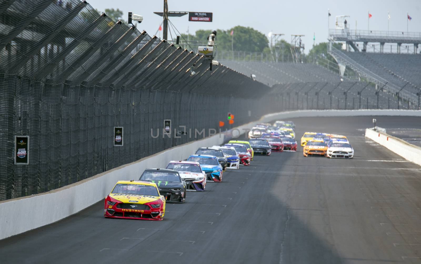 Joey Logano (22) races for position for the Big Machine Hand Sanitizer 400 Powered by Big Machine Records at Indianapolis Motor Speedway in Indianapolis, .