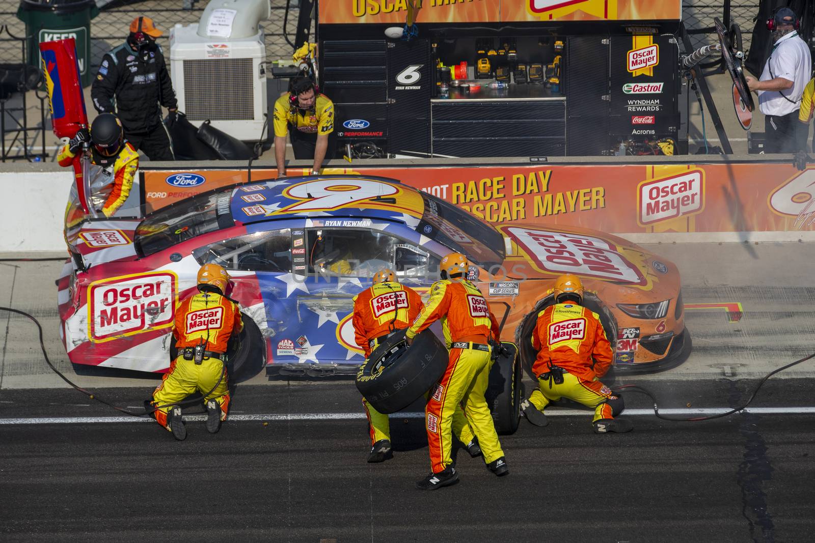Ryan Newman (6) and crew make a pit stop for the Big Machine Hand Sanitizer 400 Powered by Big Machine Records at Indianapolis Motor Speedway in Indianapolis, .