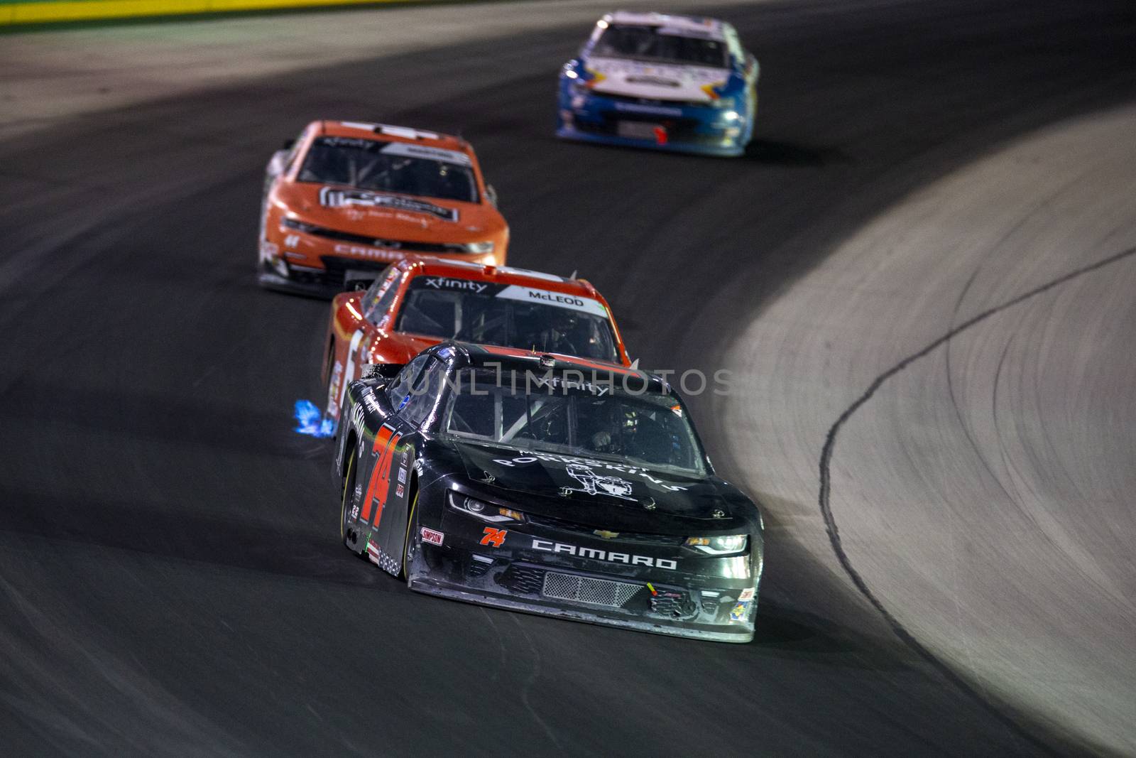 Bayley Currey (74) races for position for the Alsco 300 at Kentucky Speedway in Sparta, Kentucky.
