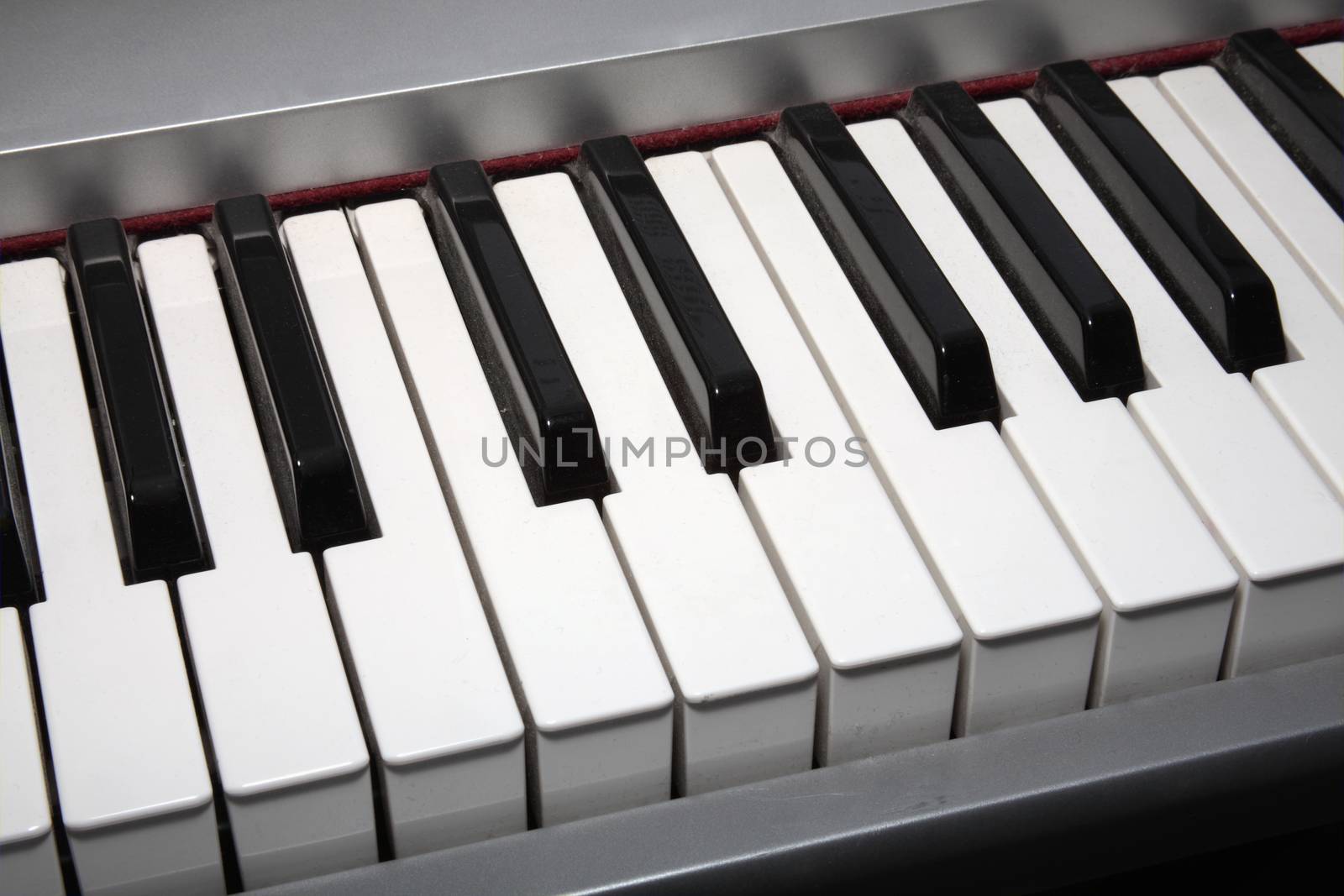 Close up of keys of an electric piano keyboard musical instrument