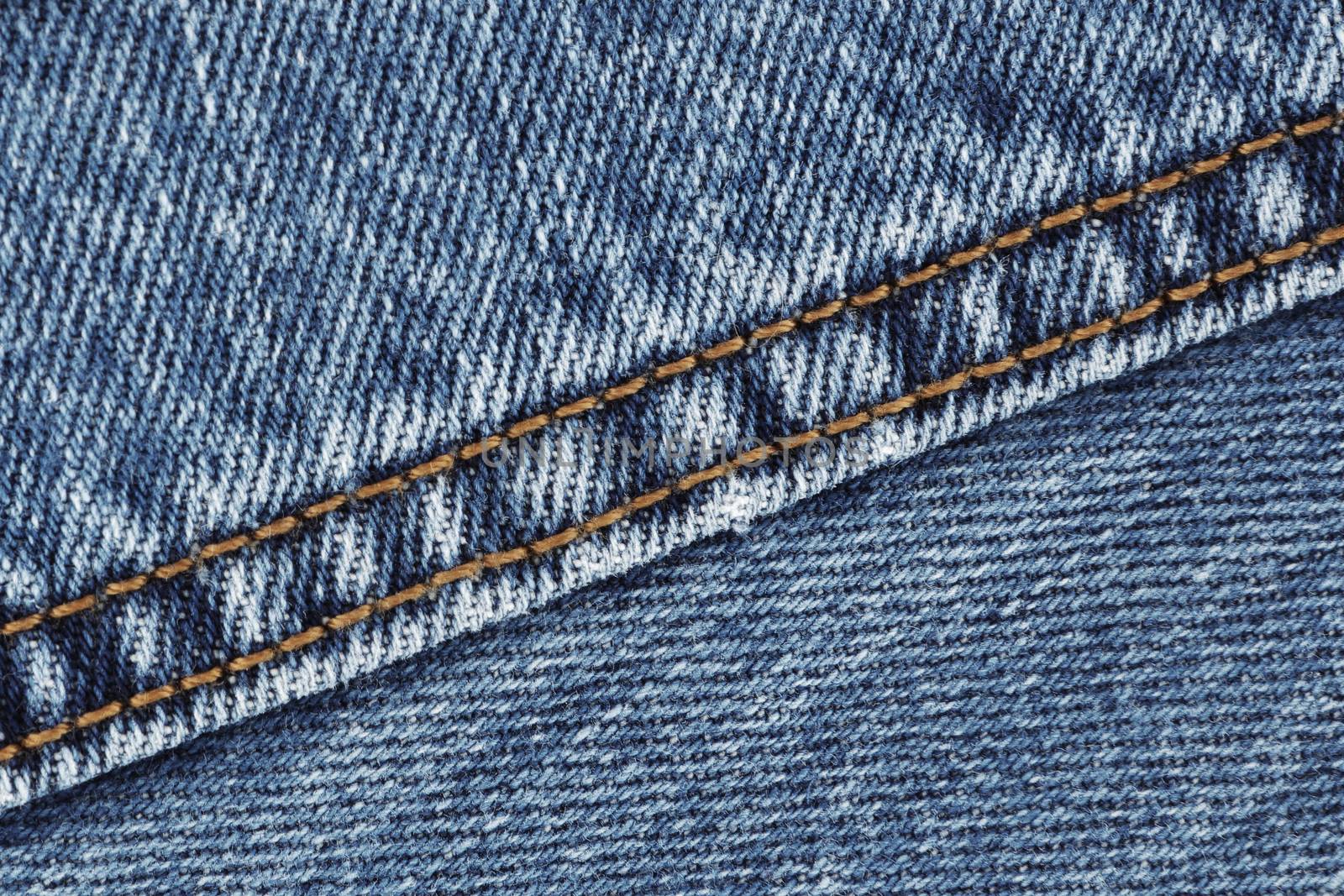 A denim jeans seam double stitch close up blue