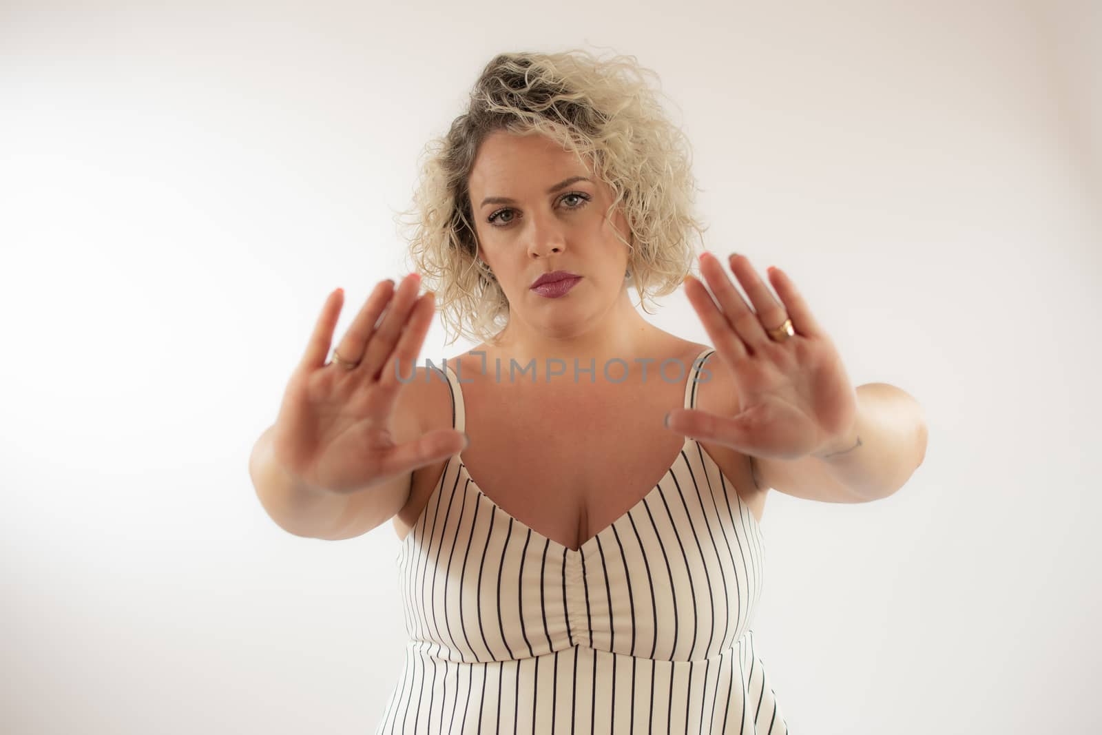 Blonde woman with serious gesture