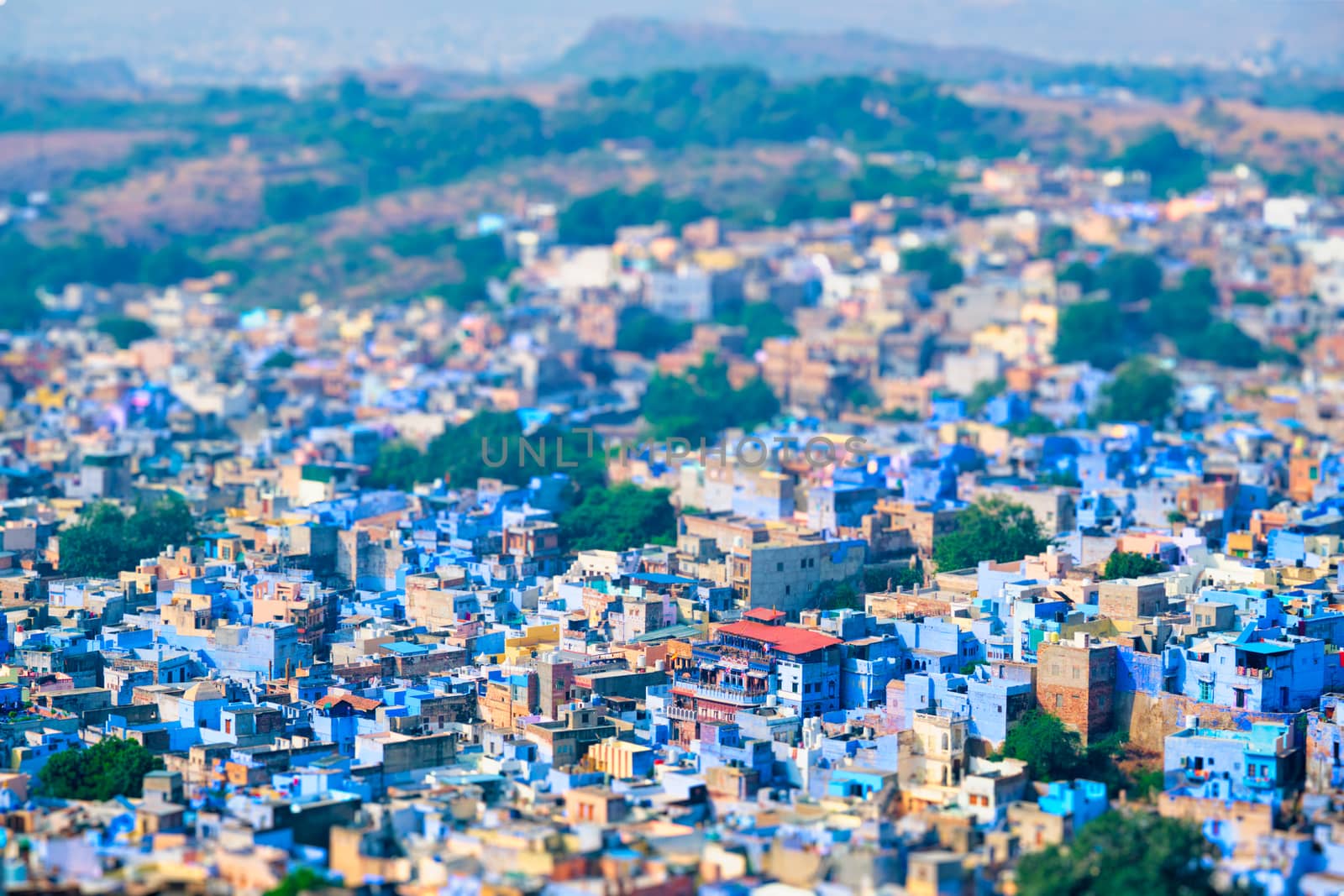 Aerial view of Jodhpur, also known as Blue City due to the vivid blue-painted Brahmin houses around Mehrangarh Fort. Jodphur, Rajasthan, India. Tilt shift miniature toy effect