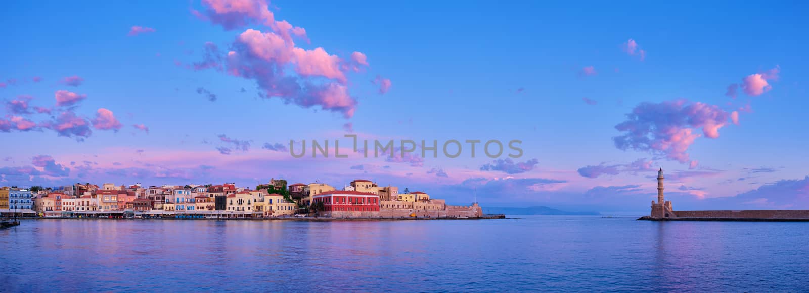 Panorama of picturesque old port of Chania is one of landmarks and tourist destinations of Crete island in the morning on sunrise. Chania, Crete, Greece