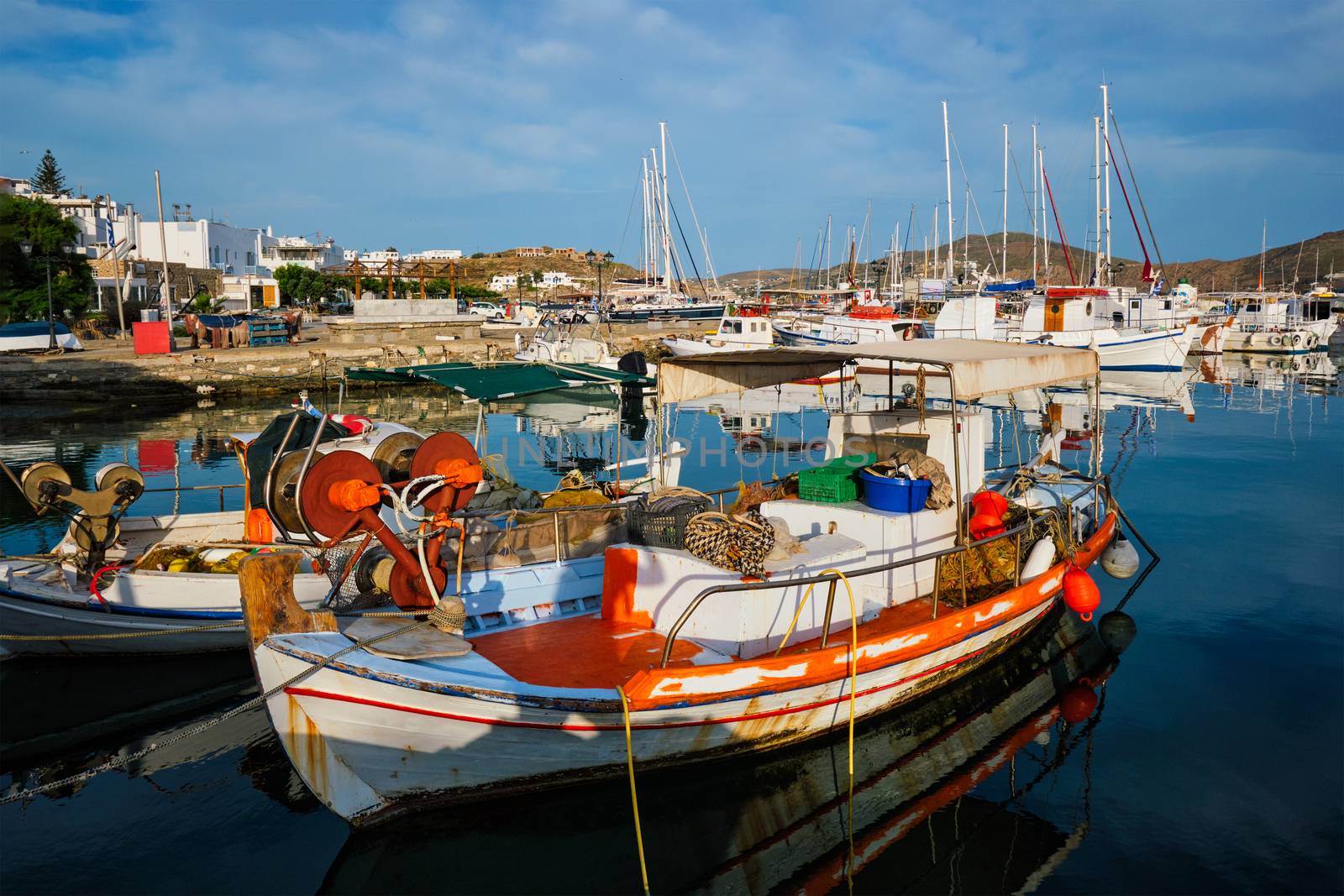 Fishing boats in port of Naousa on sunrise. Paros lsland, Greece