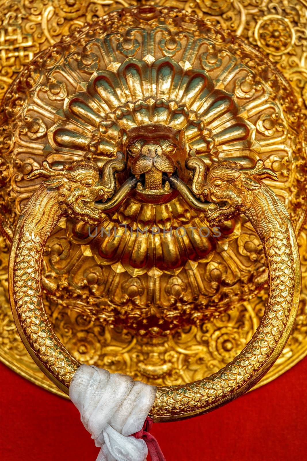 Lion shaped door handle in Buddhist temple by dimol