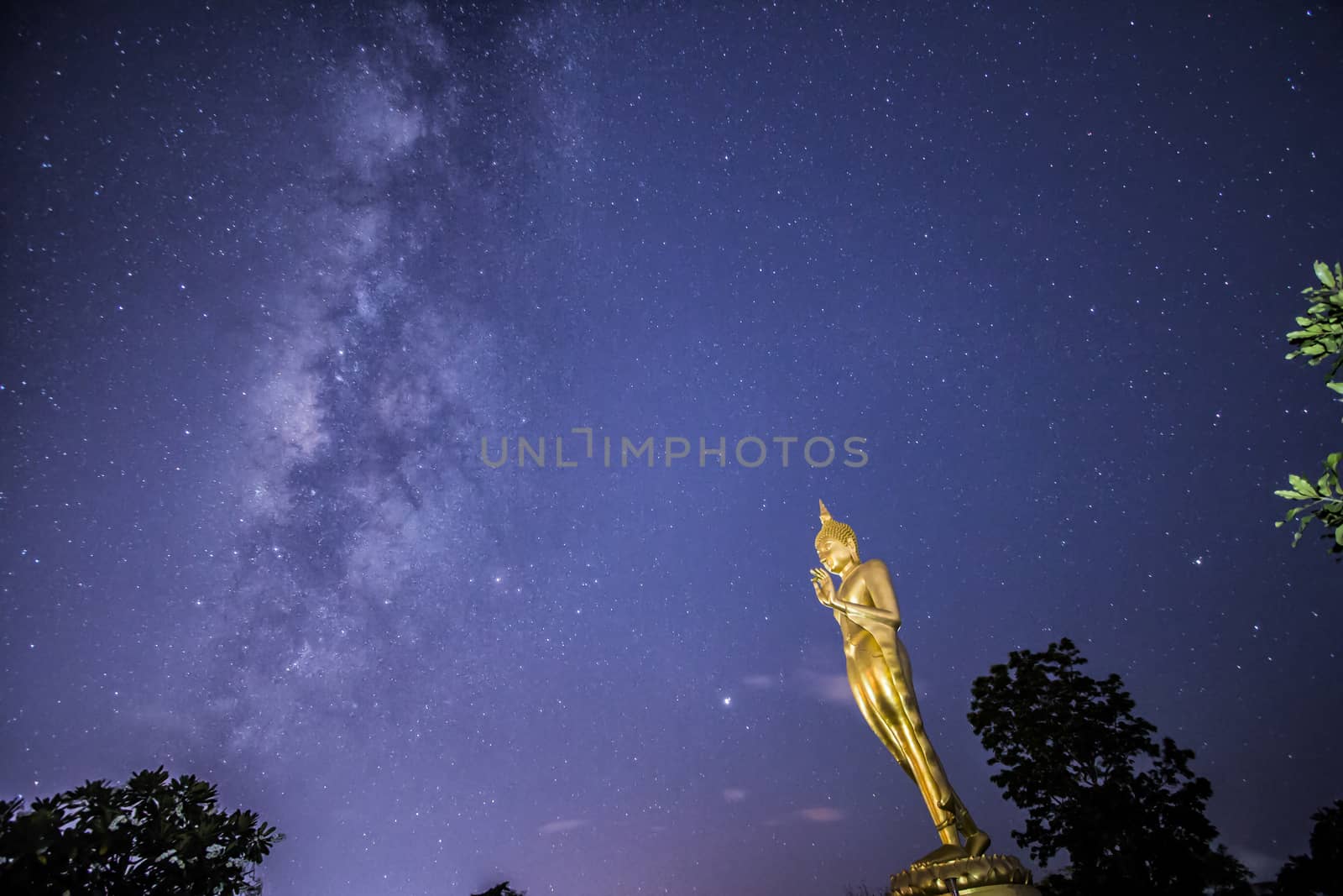 Buddha statue on the milky way background in Thailand by Gobba17