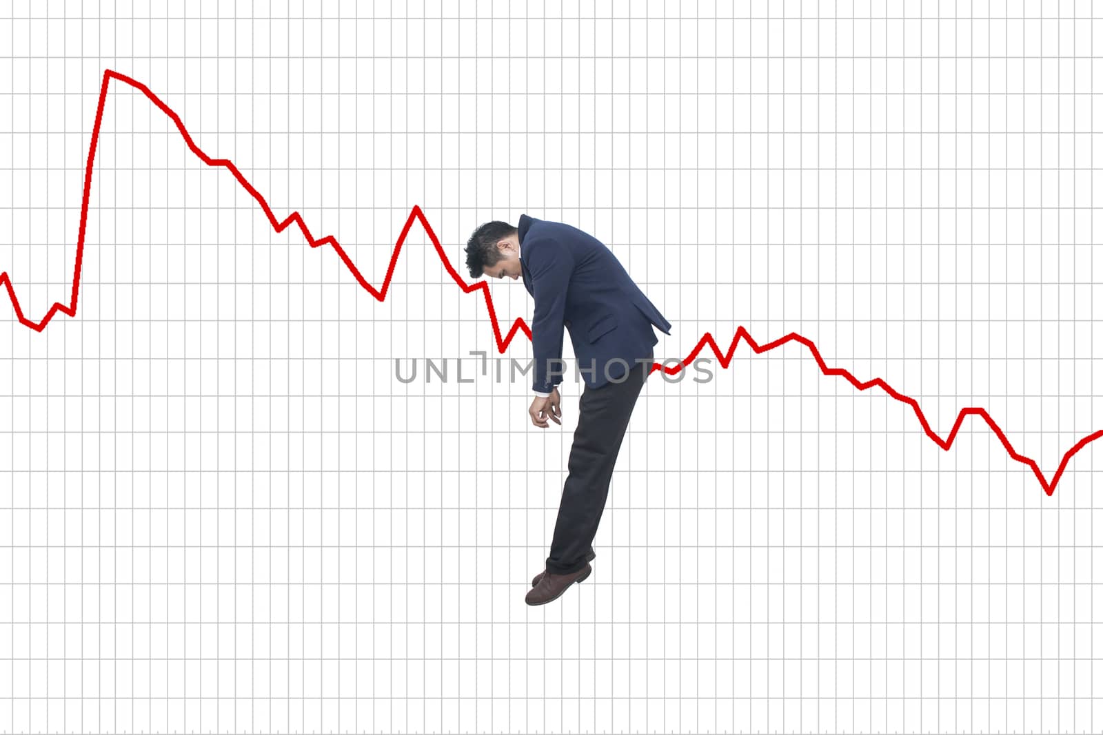 sad asian businessman falling down over business graph background