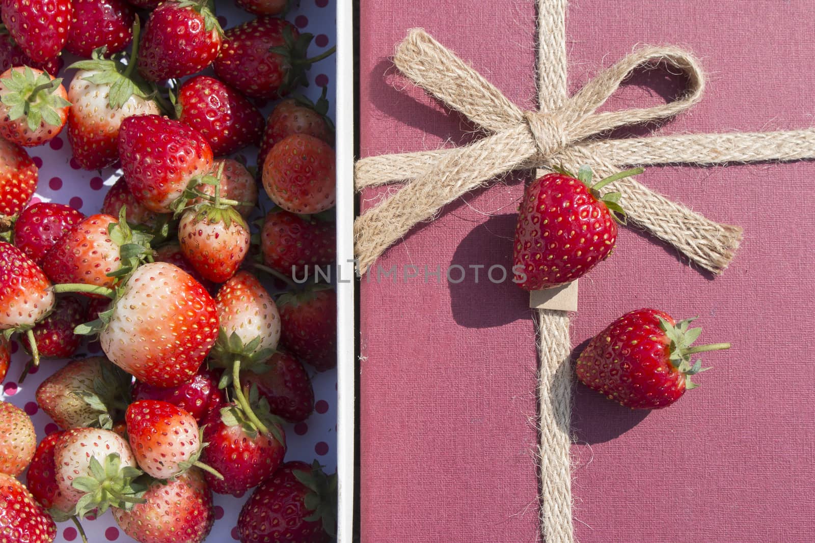 fresh strawberries in red gift box ,close up