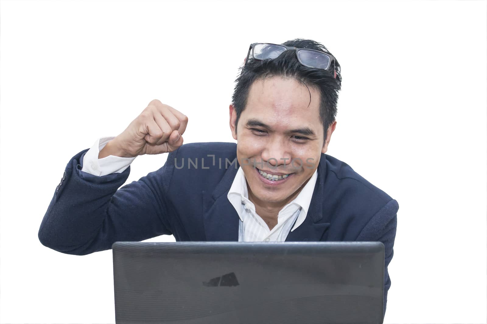  Asian businessman keeping arms raised and expressing positivity on white background,Celebrating success