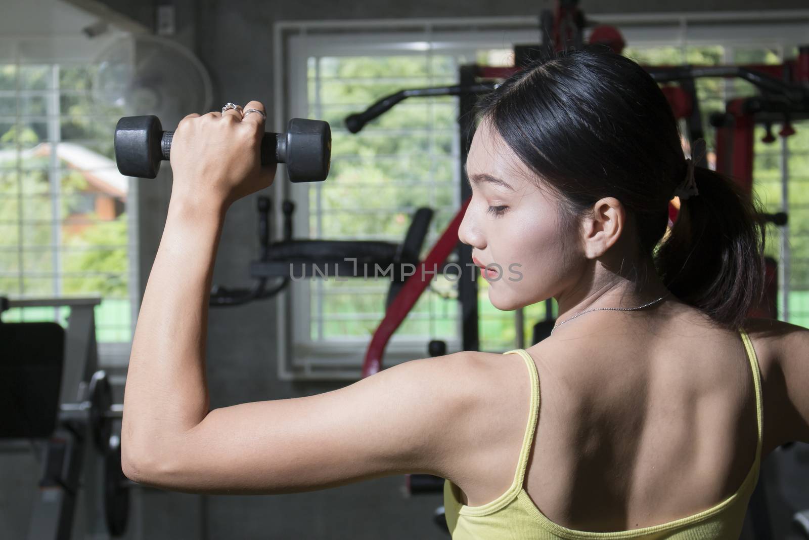 Asian women with dumbbells by Gobba17