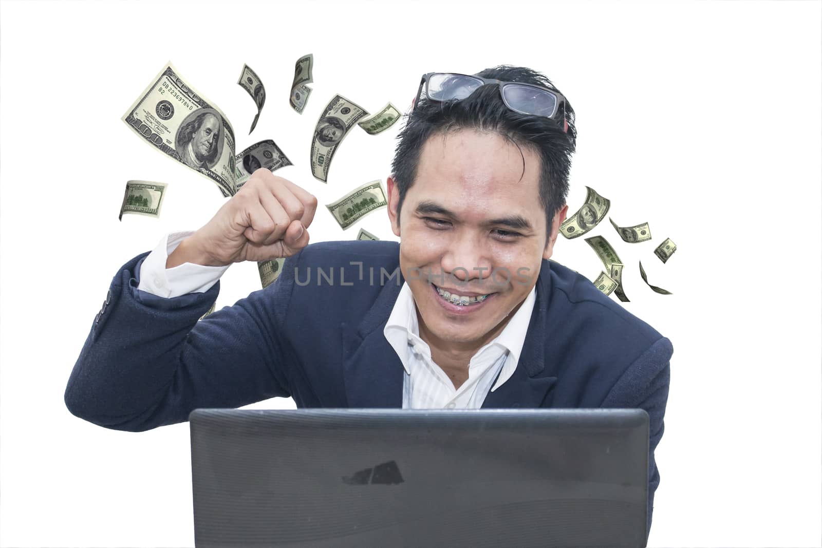  Asian businessman keeping arms raised and expressing positivity on white background,Celebrating success,dollars flying from behind