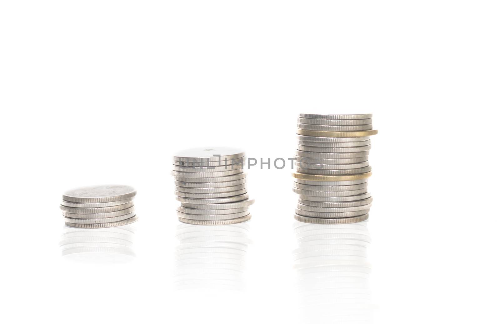 Coin stacks on a white background