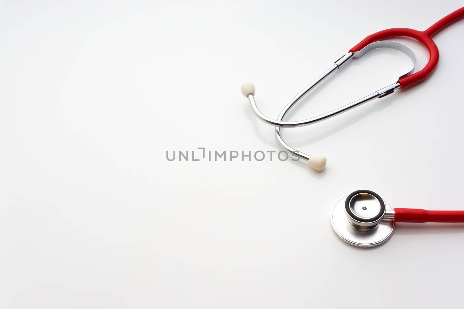 Stethoscope on white background. Healthcare dan Copy Space concept