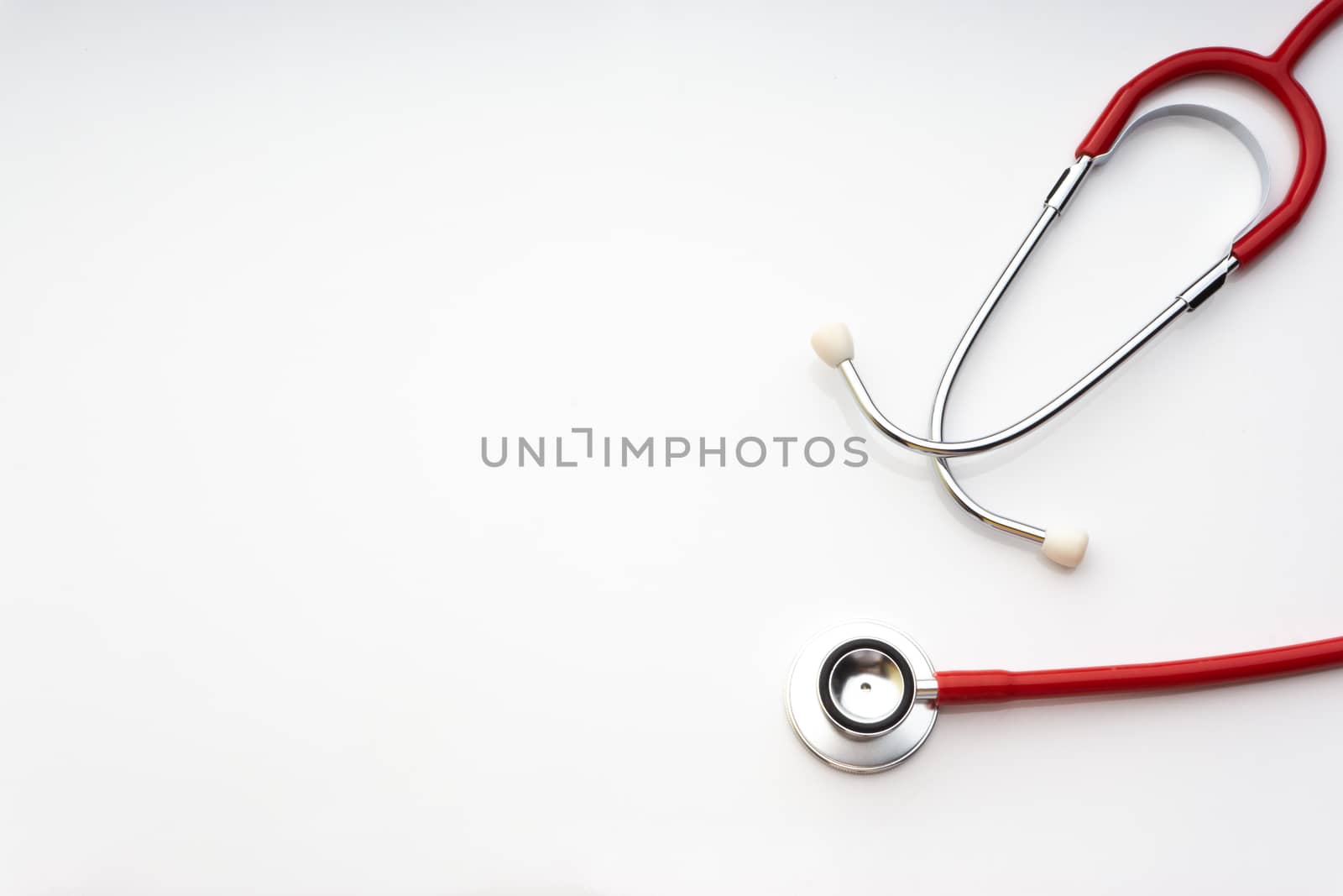 Stethoscope on white background by silverwings