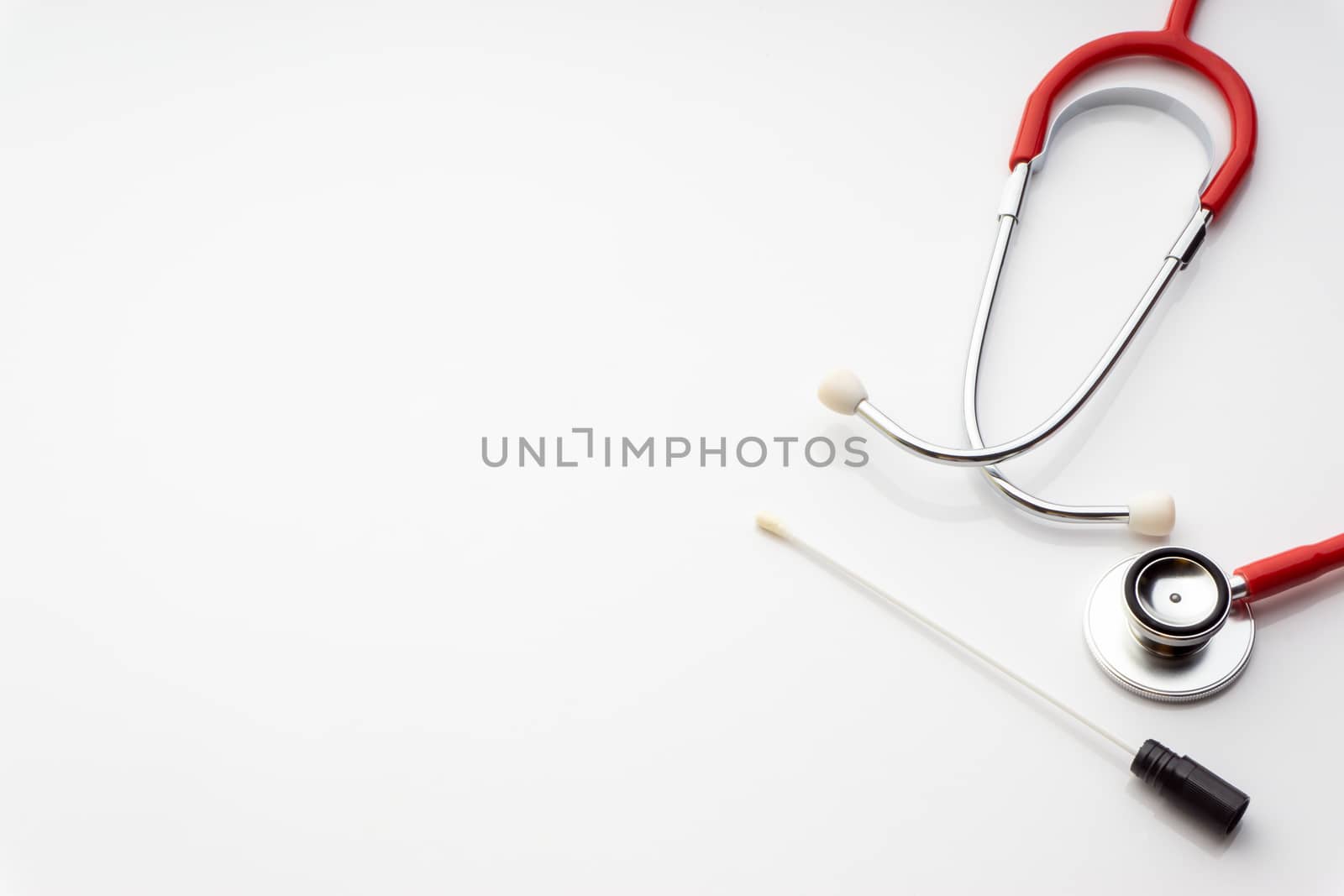 Medical swab and stethoscope on white background. Healthcare dan Copy Space concept